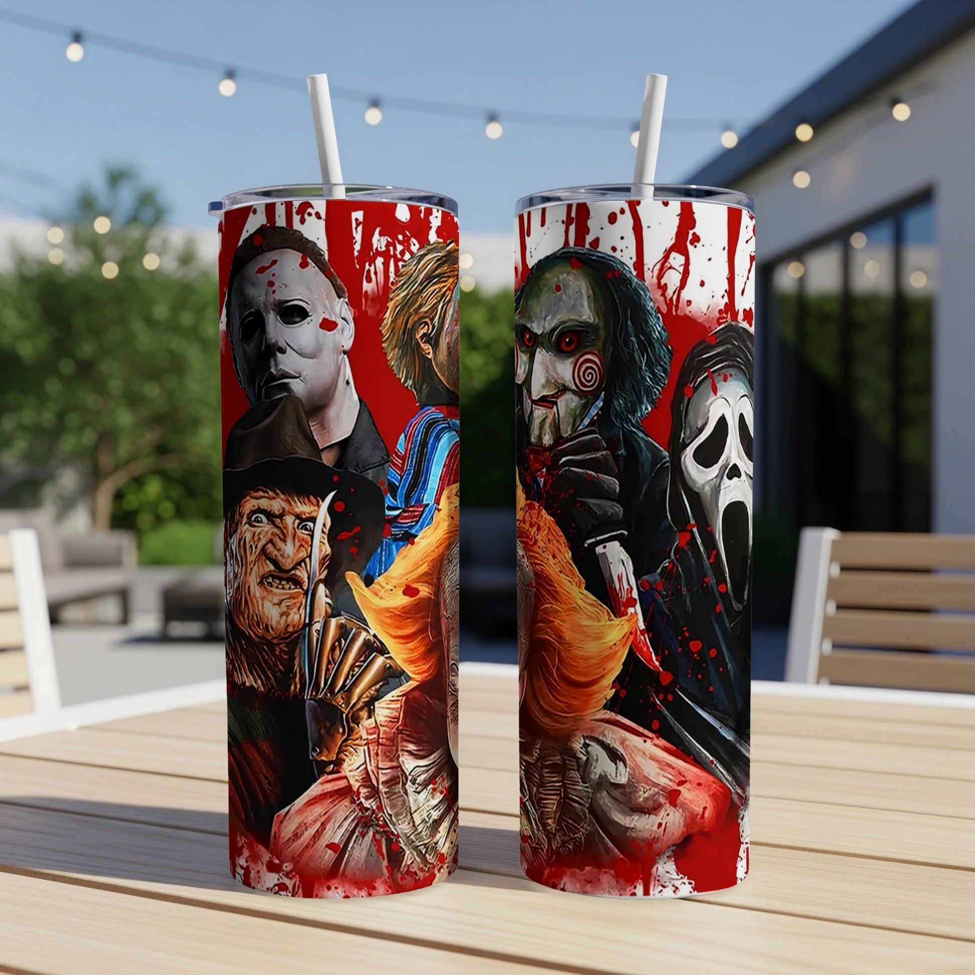 Two tumblers with horror movie characters, blood splatter, and straws.