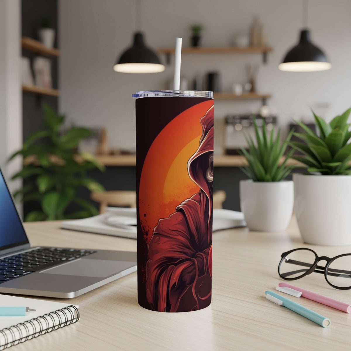 Tumbler with grim reaper illustration on red background with straw.