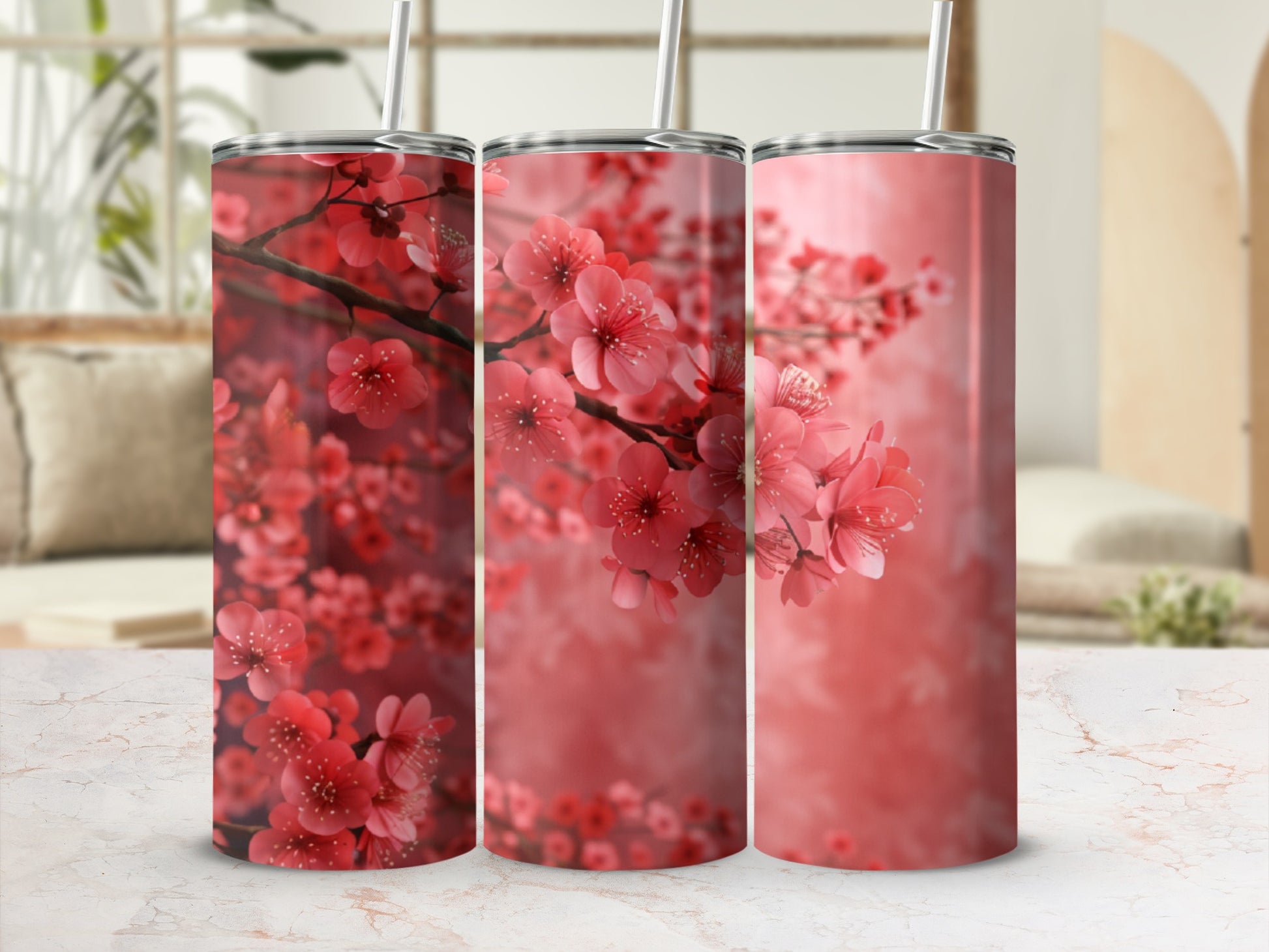 Three tumblers with a pink cherry blossom design.