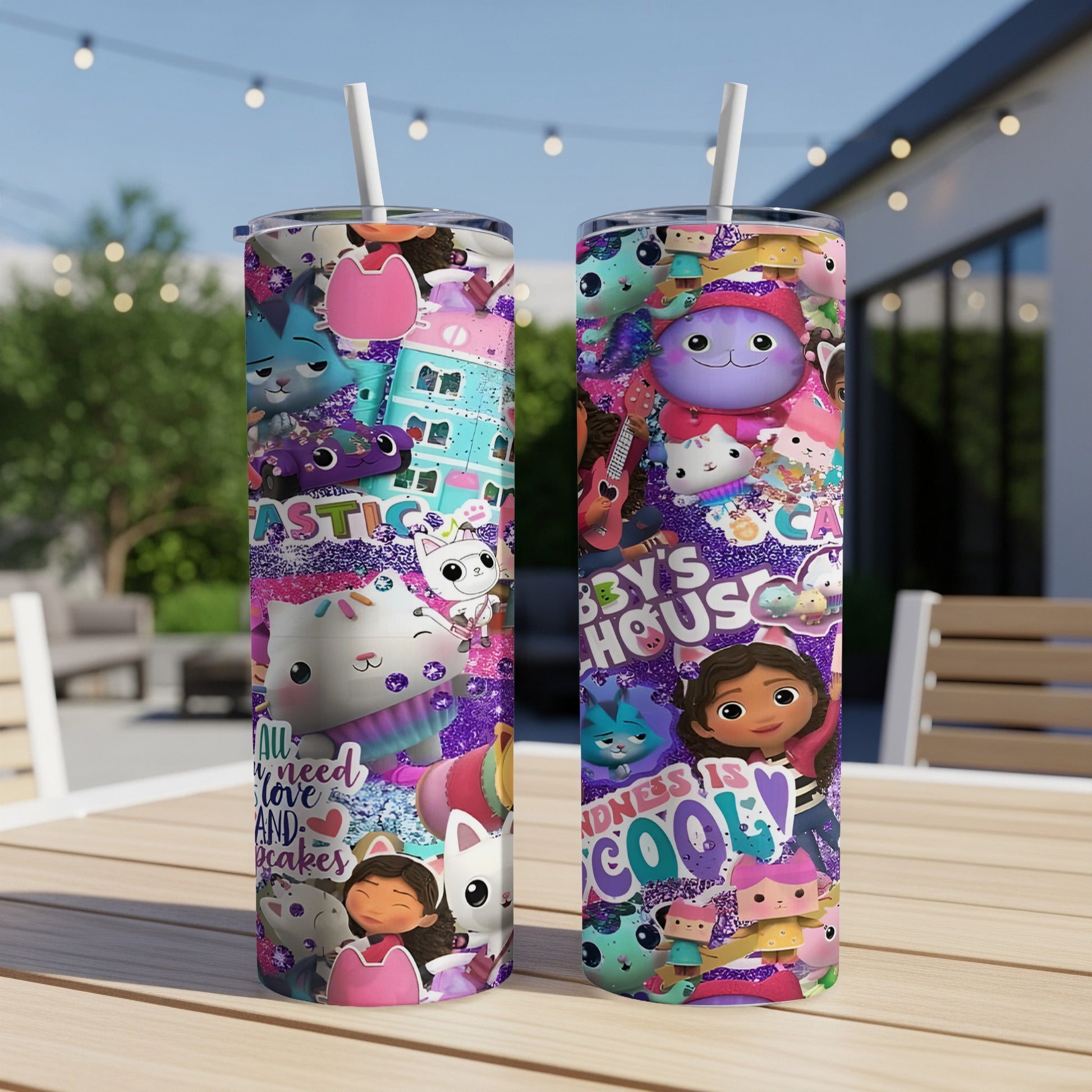 Gabby's Dollhouse tumbler with cats, characters, and colorful patterns.