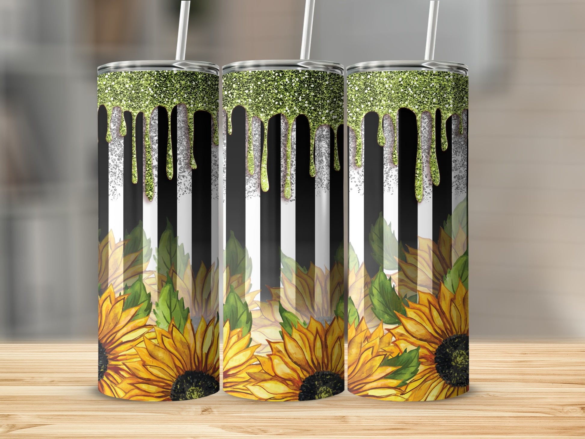Three tumblers with sunflowers, green glitter drips, and black and white stripes.
