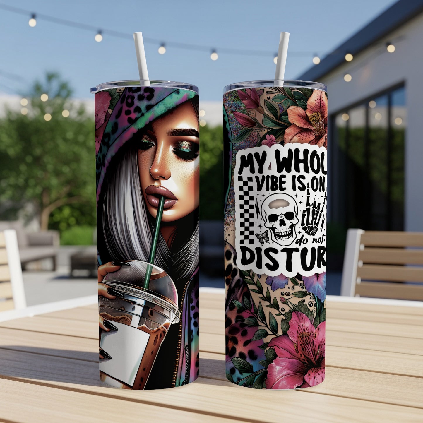 Two tumblers with a woman's face and a skull graphic with text.
