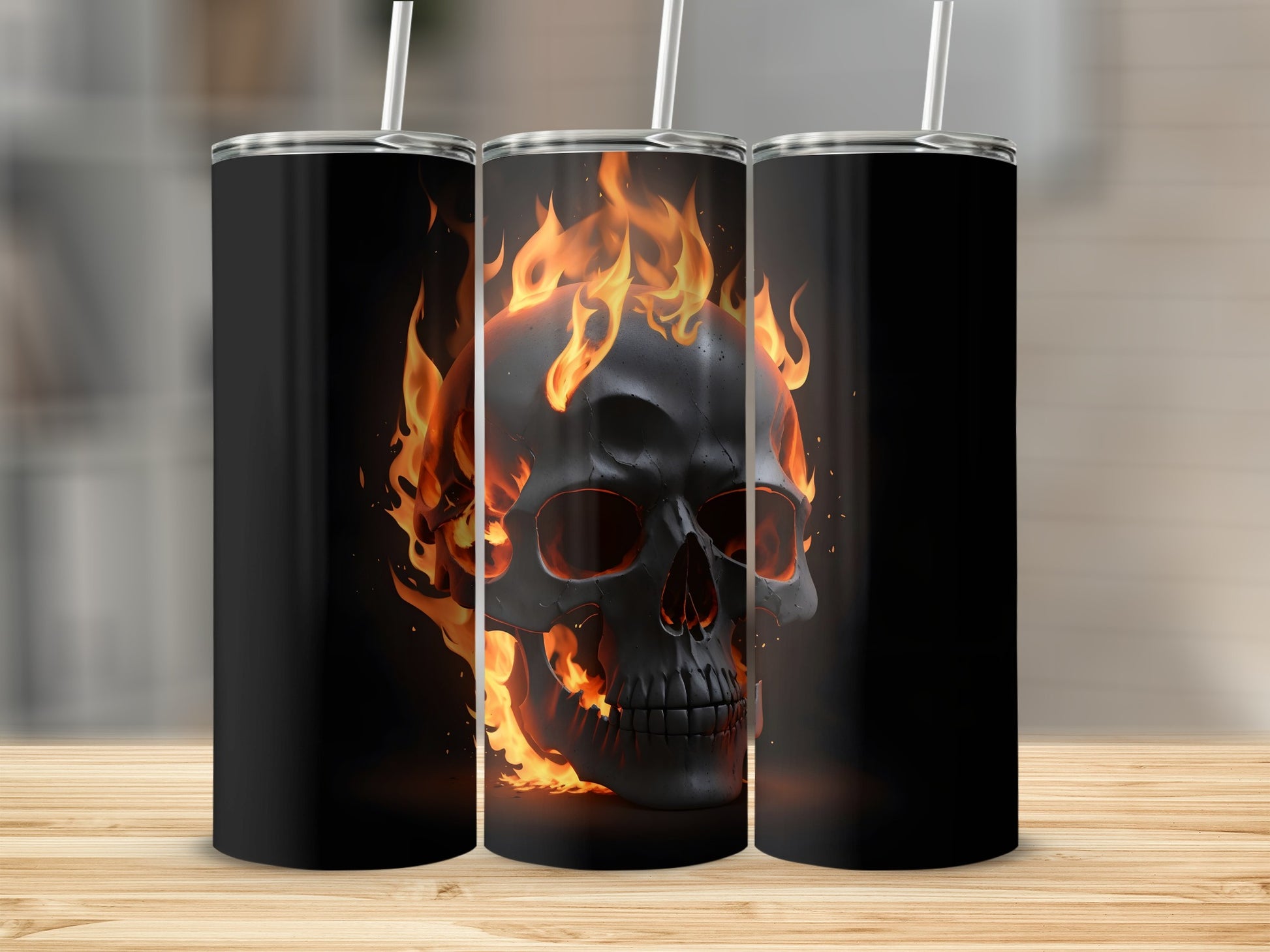 Black tumbler with a fiery skull design.