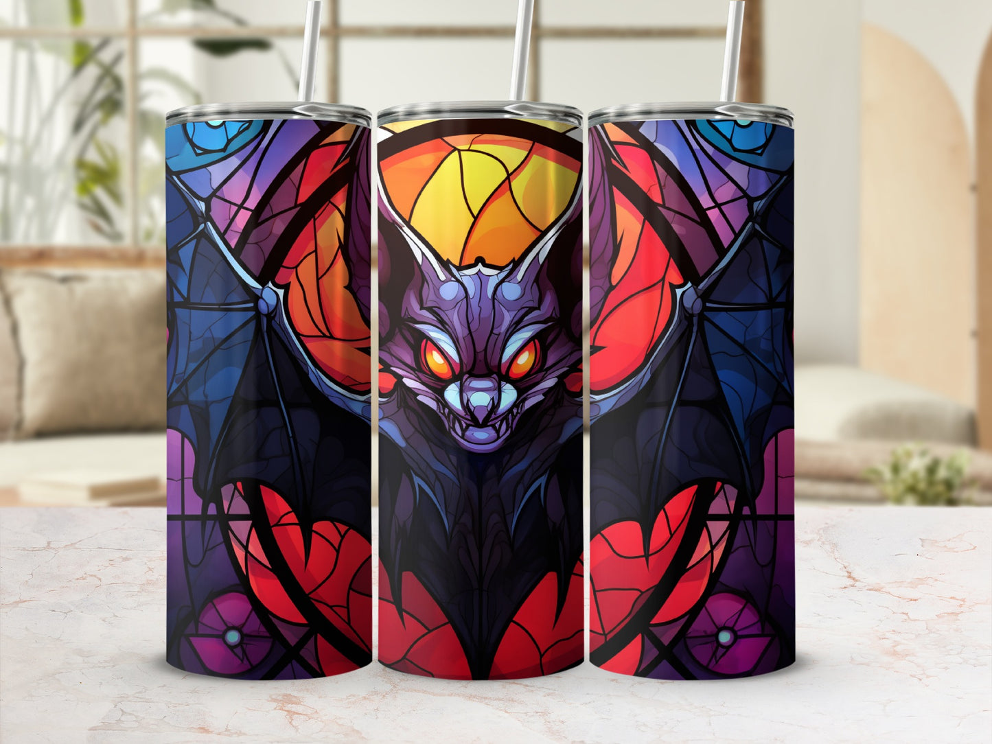 Stained glass bat tumbler with red, orange, and purple hues.