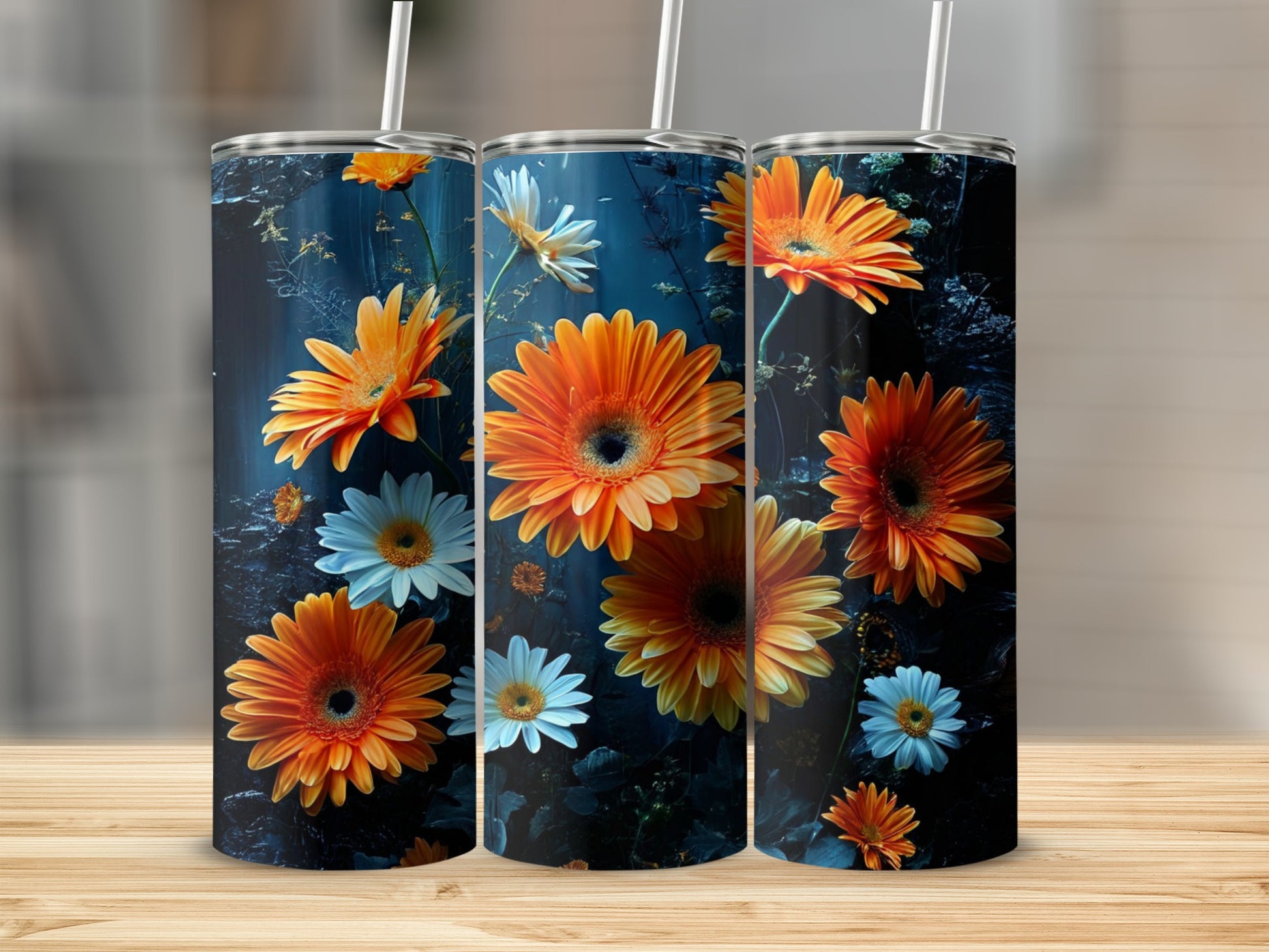 Three tumblers with vibrant orange and white gerbera daisies against a dark floral background.