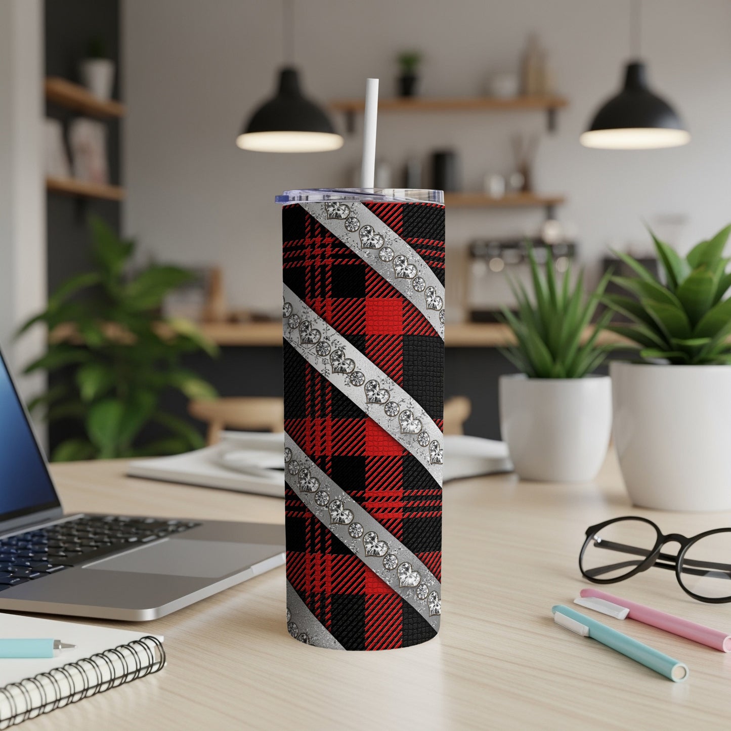 Red, black, and white plaid tumbler with diamond accents and white straw.
