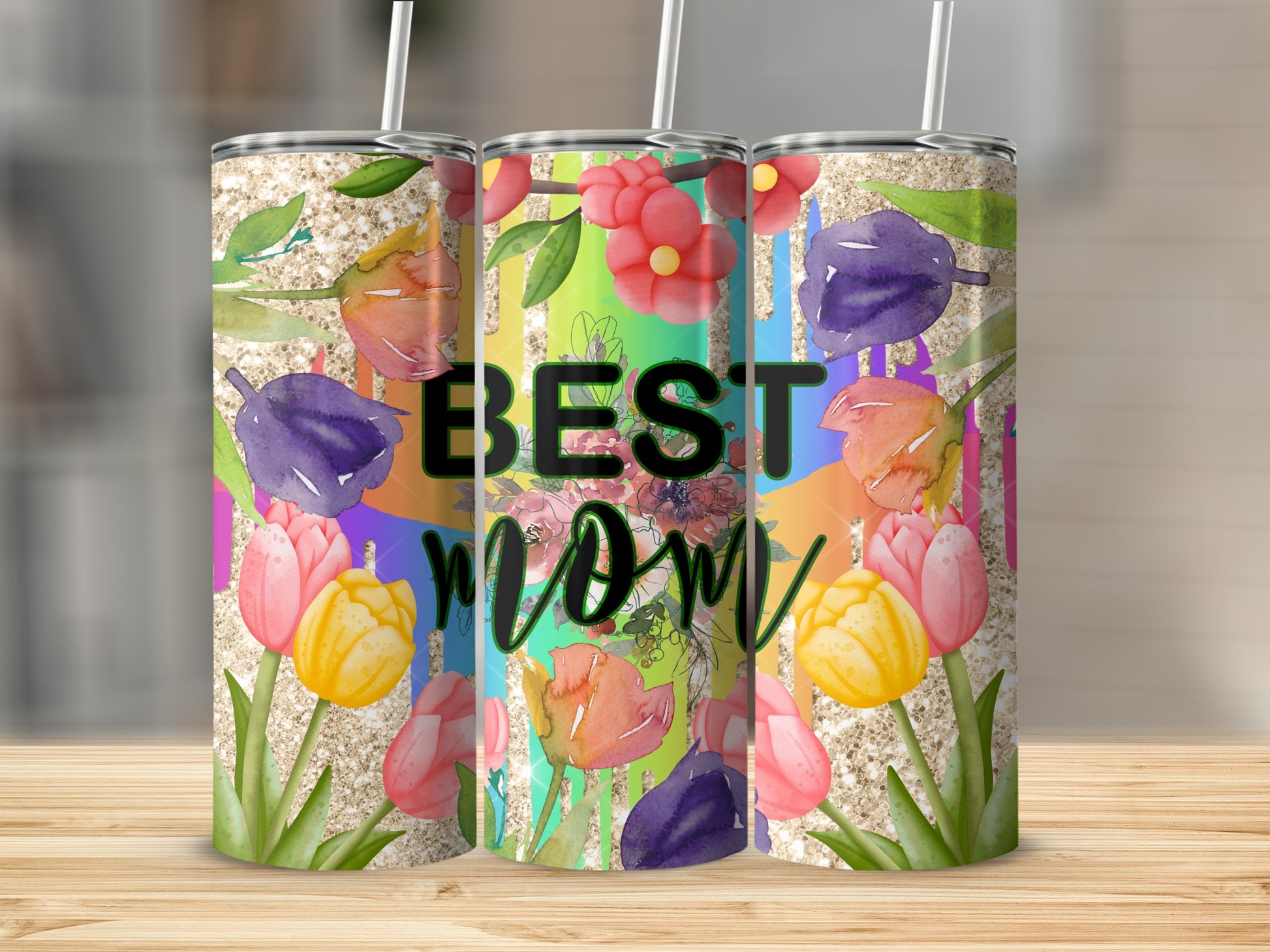 Glitter tumbler with "Best Mom" and colorful floral watercolor design.