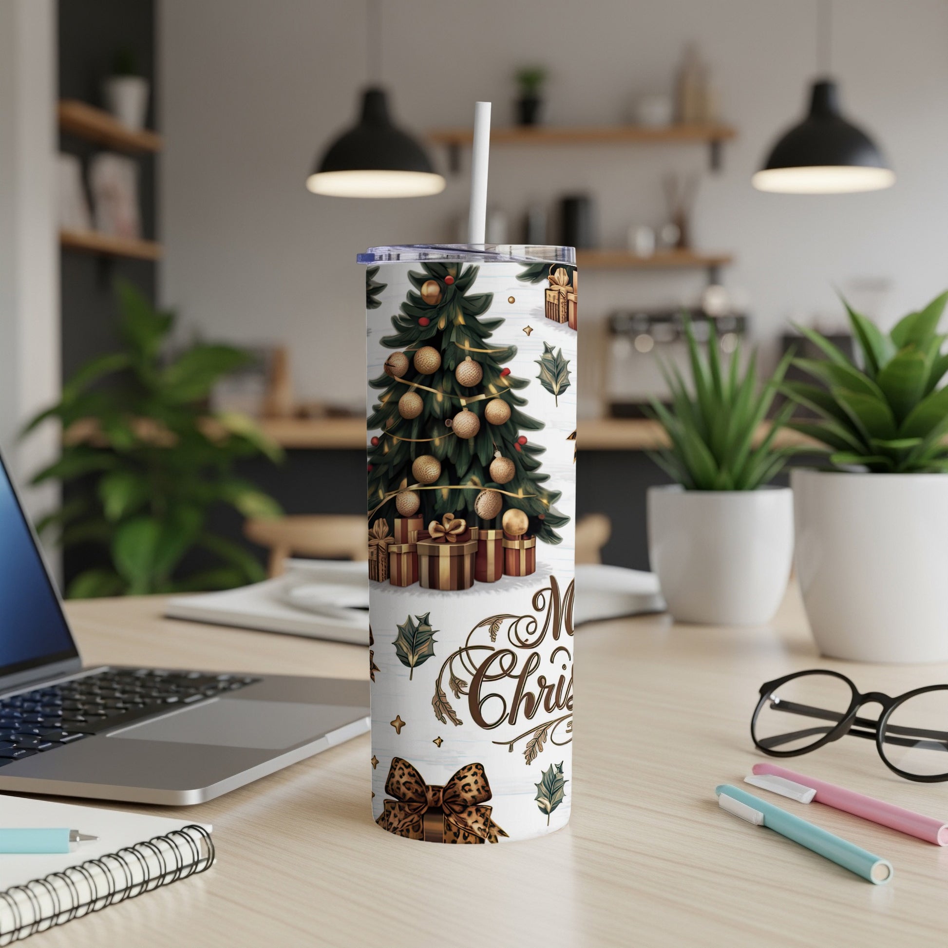 Christmas tree and gifts on a tumbler with "Merry Christmas" text.