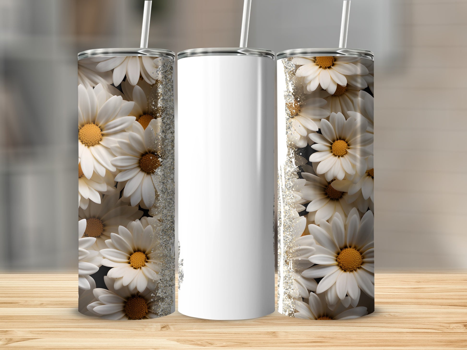 Three tumblers with a daisy floral pattern and glitter accents.