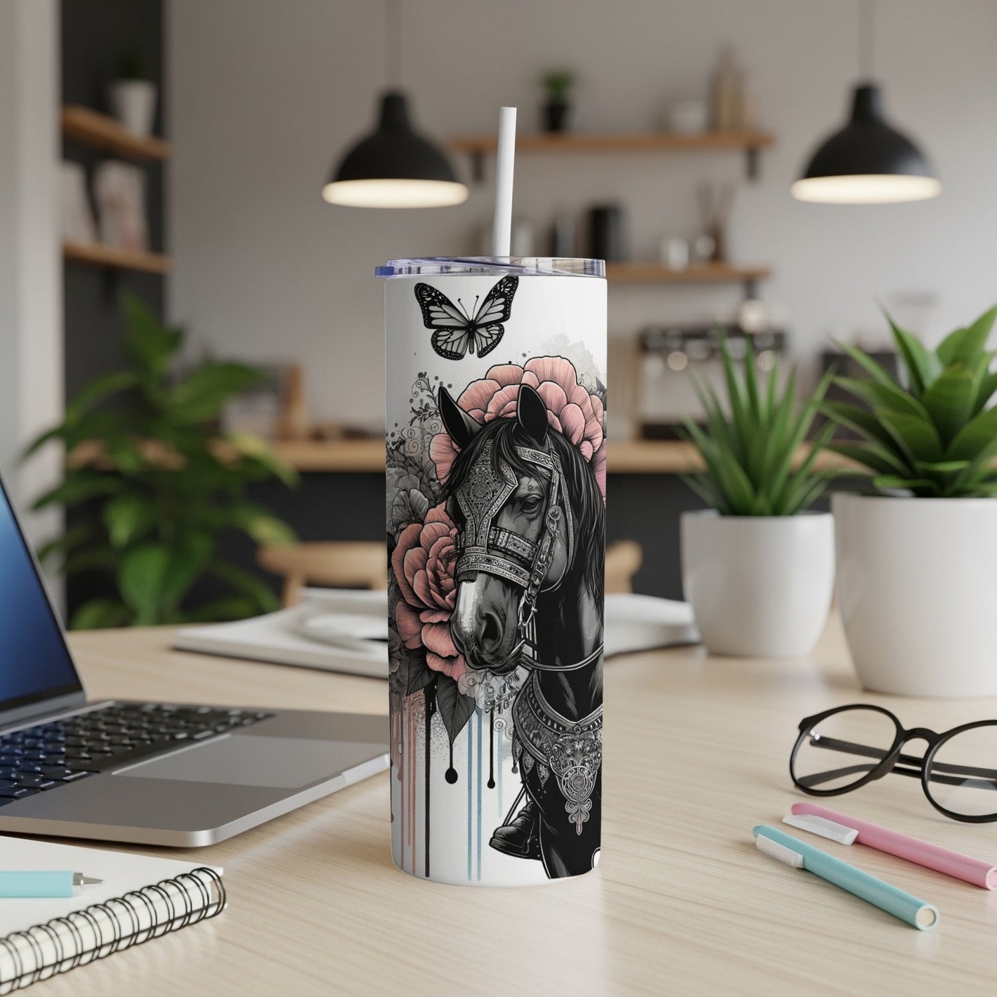 Black horse with pink flowers and butterfly on a white tumbler.