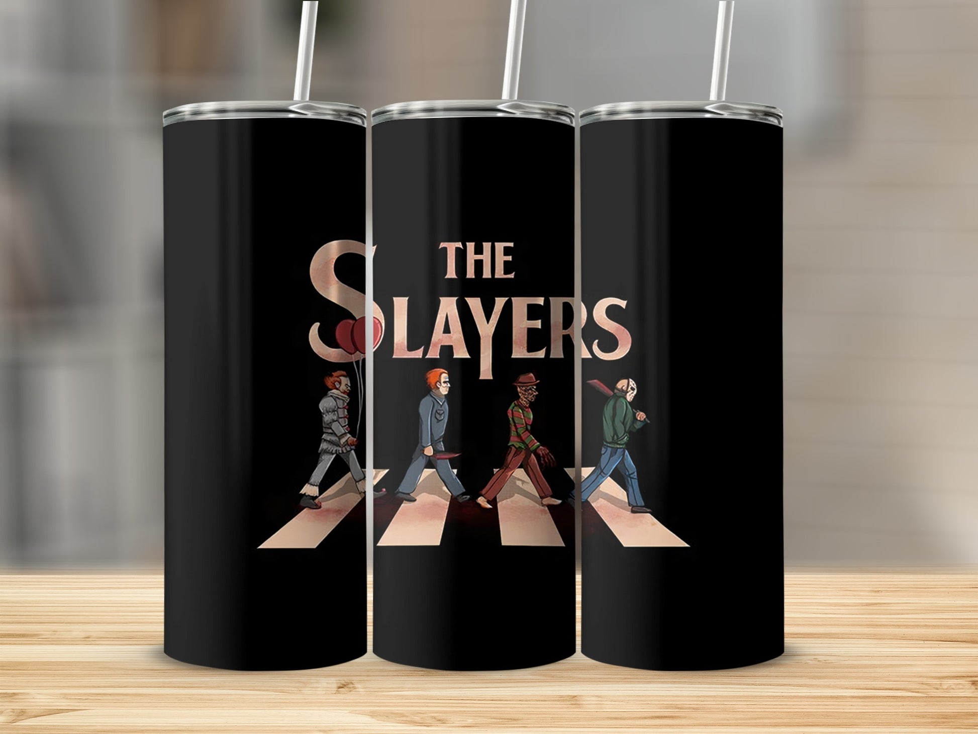 Tumblers featuring horror movie characters walking across Abbey Road, with "THE SLAYERS" text.