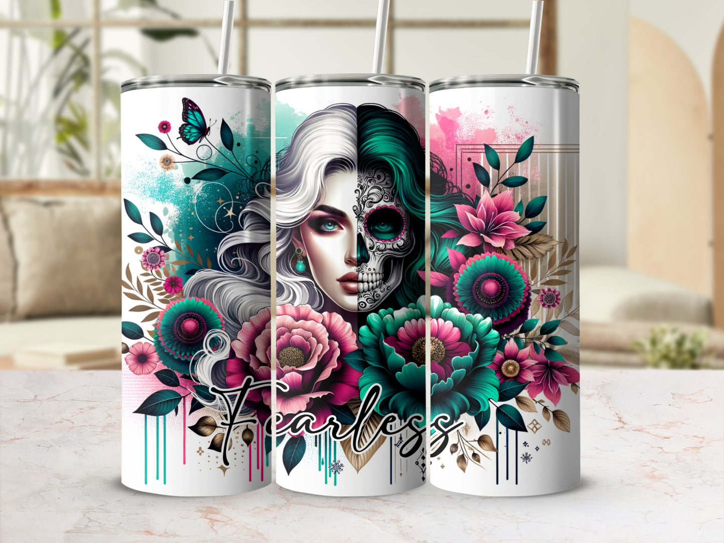 "Fearless" tumbler with skull-faced woman and floral accents.