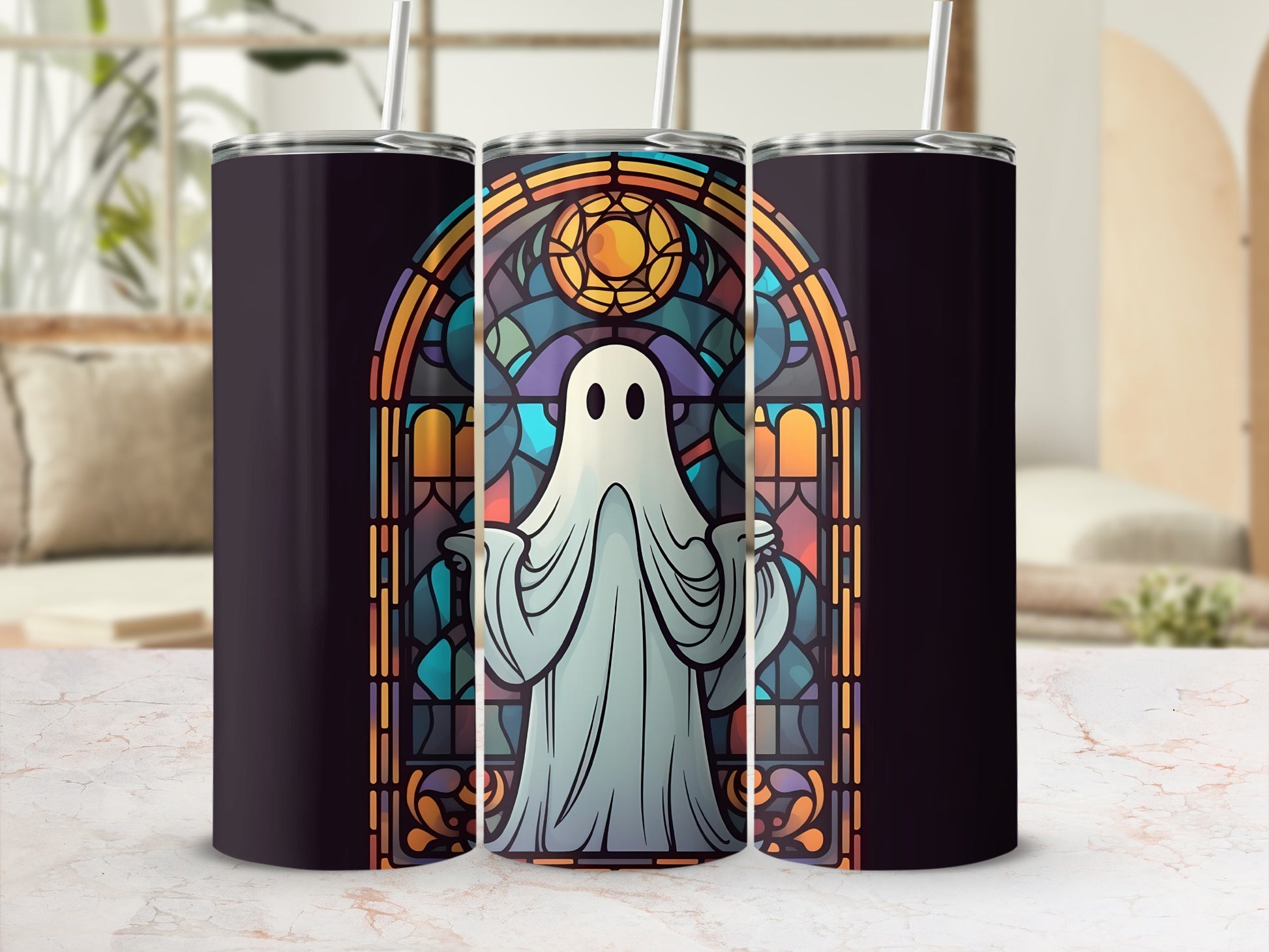 Stained glass ghost design on a dark tumbler with straw.