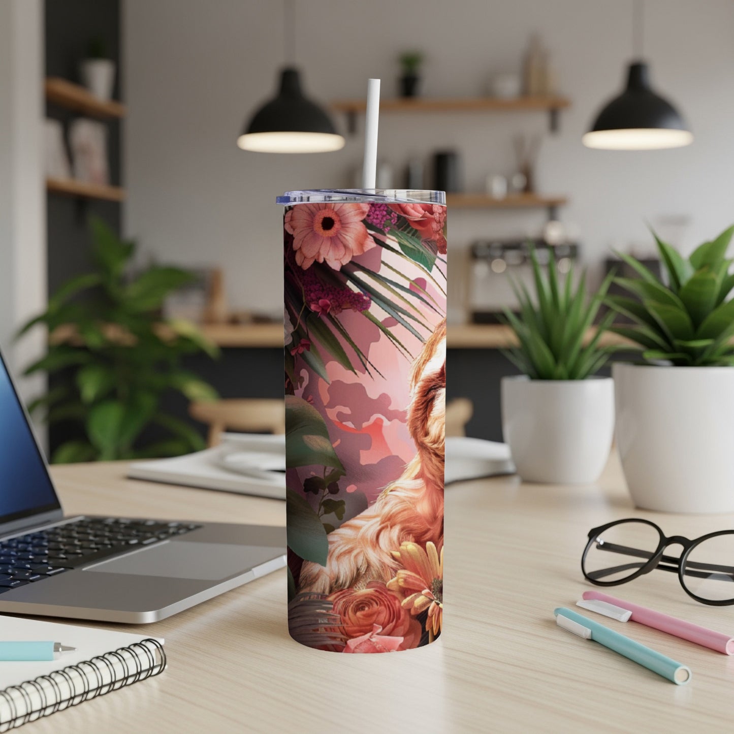 Golden retriever and floral pattern on a skinny tumbler with a straw.