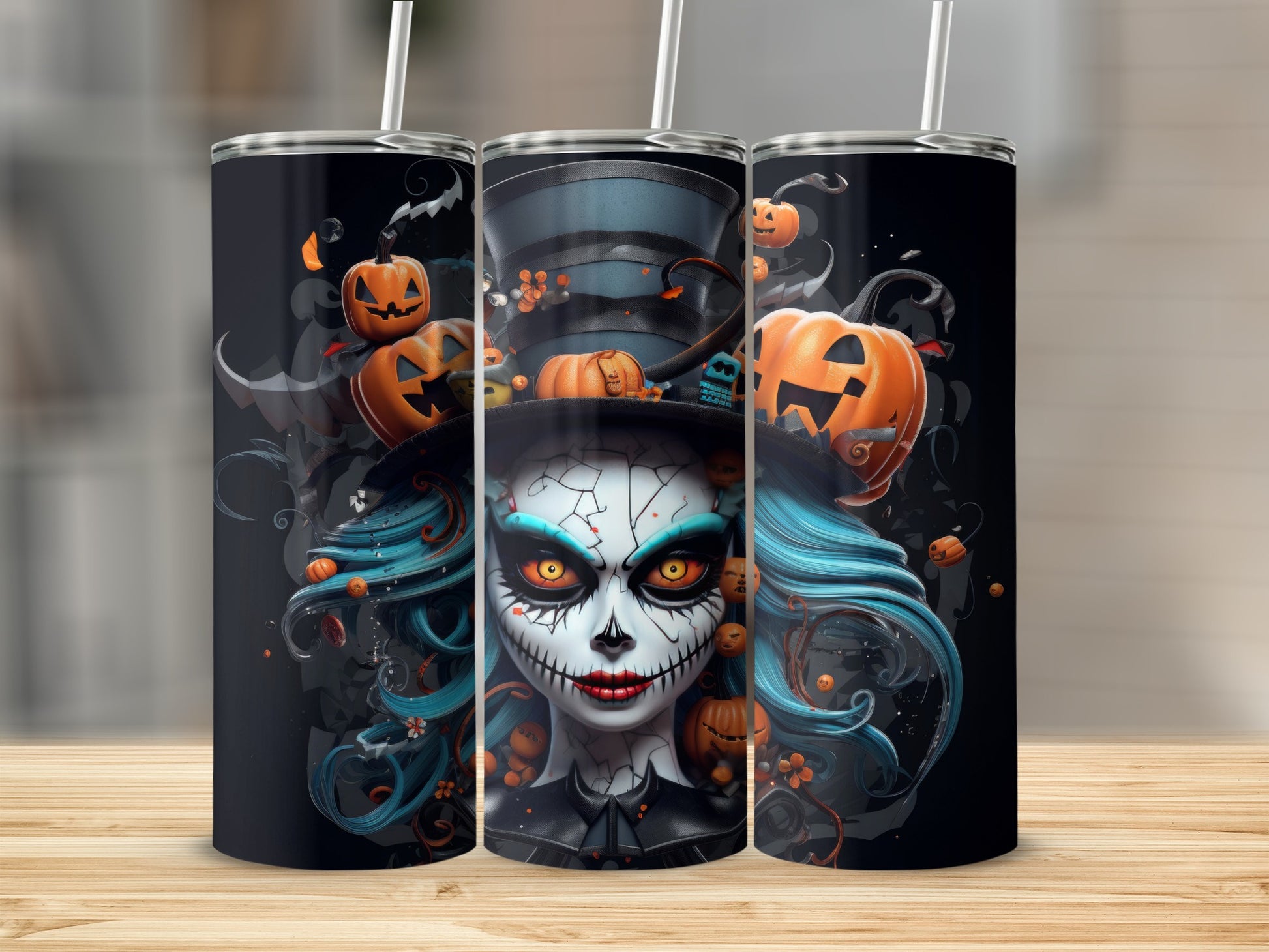 Three tumblers with Halloween designs featuring a skeleton woman and pumpkins.