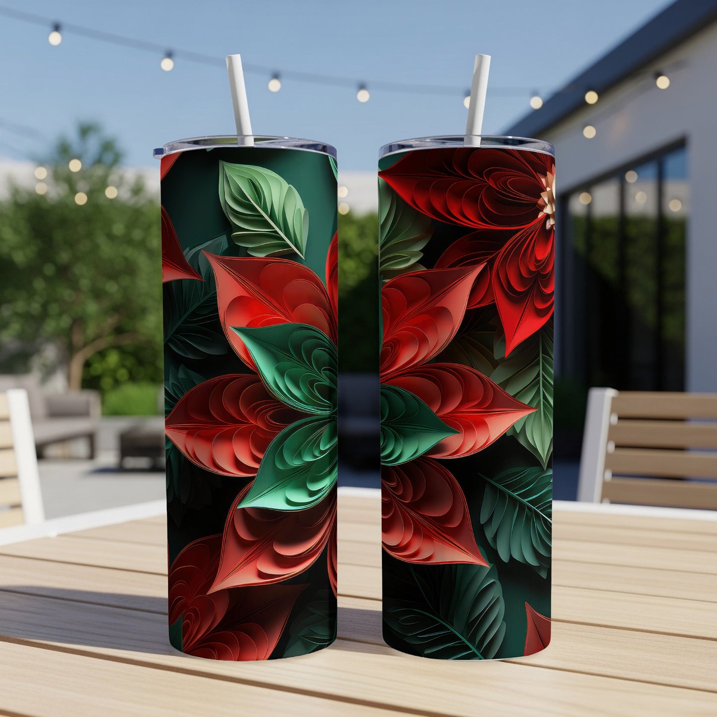 Two tall, cylindrical tumblers with a red and green floral design.