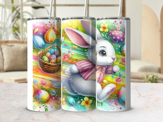 Easter bunny with basket of colorful eggs on a vibrant, floral tumbler.