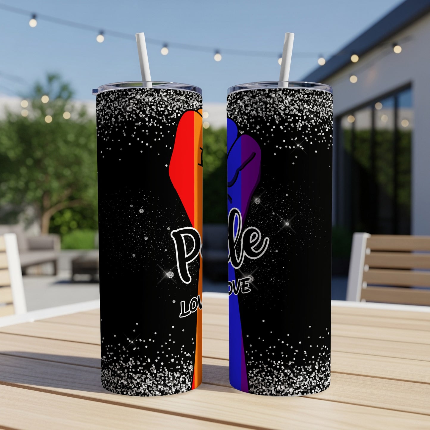 Tumbler with rainbow fist and "Pride Love" text on black background.