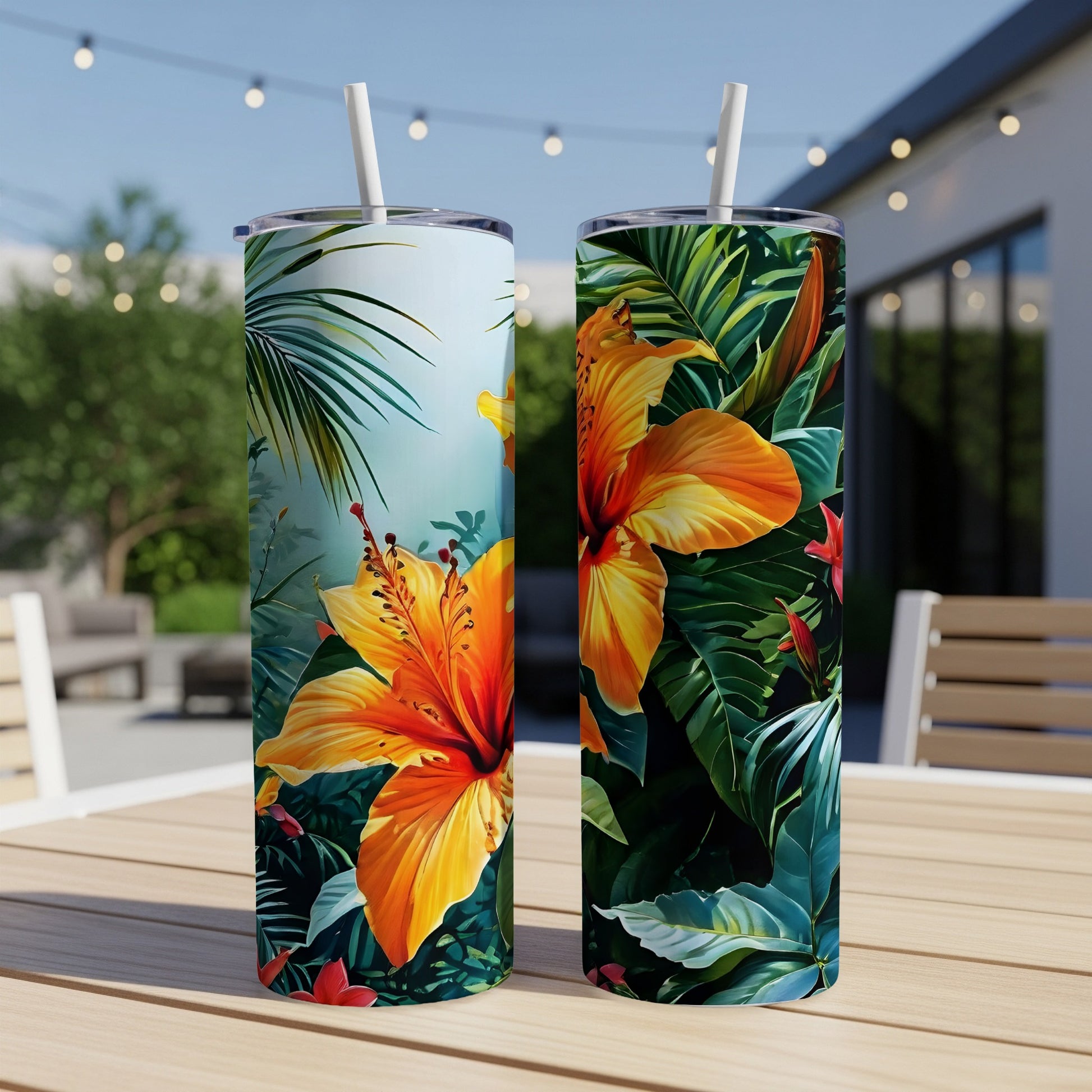 Two tumblers with tropical hibiscus flowers and palm leaves design.