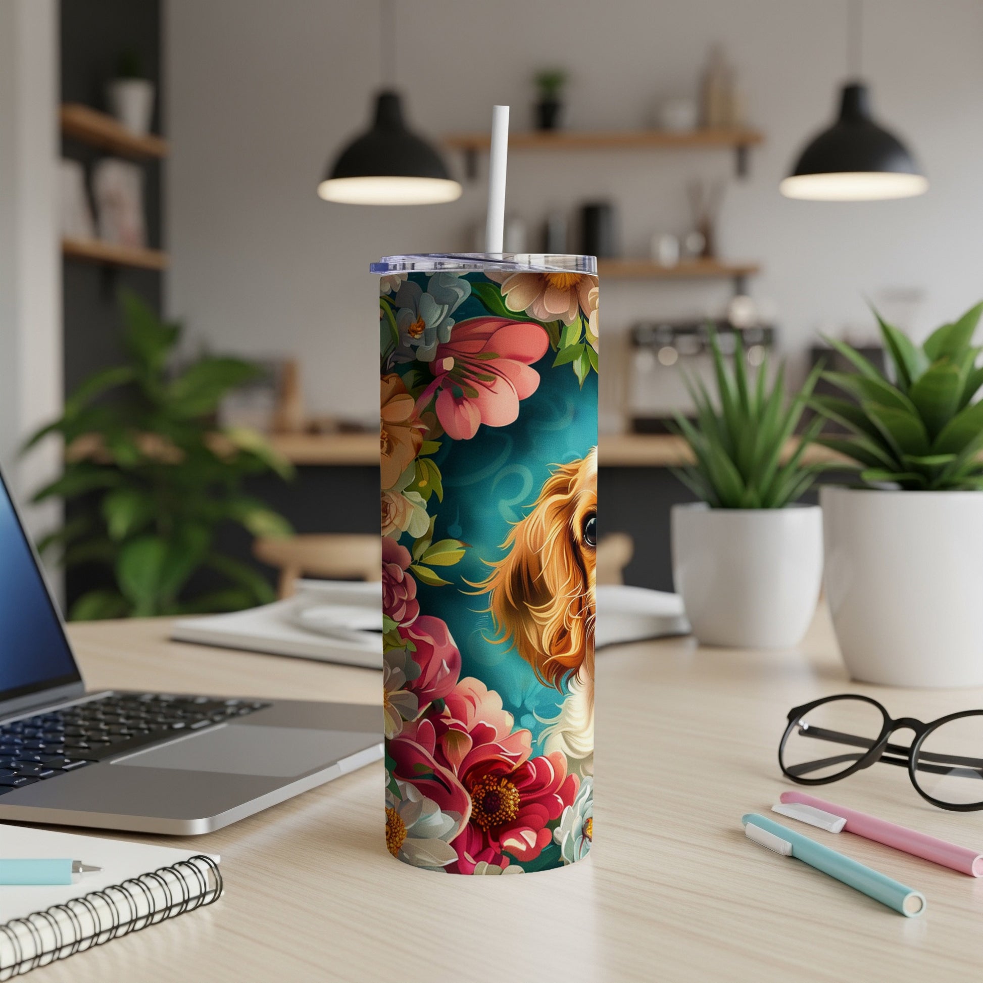Tumbler with dog portrait and floral design.