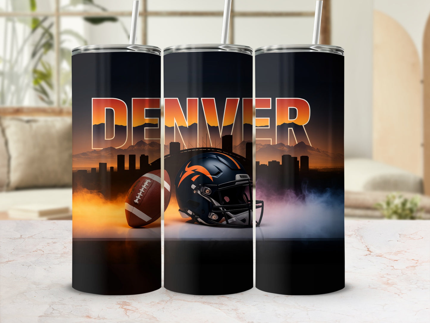 Denver Broncos helmet and football on a tumbler with city skyline background.