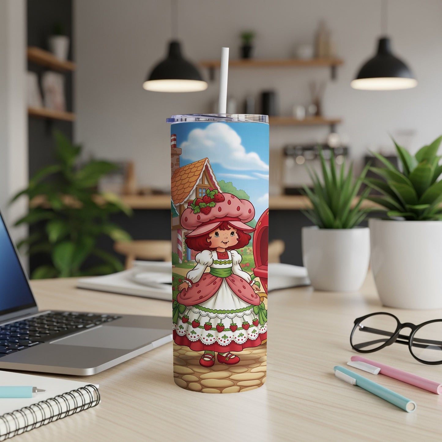 Strawberry Shortcake character on a pink and white striped tumbler.