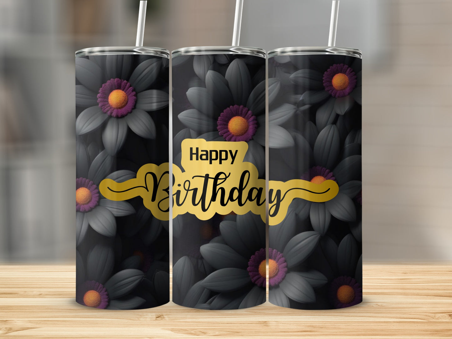 Three dark tumblers with purple and yellow floral pattern and "Happy Birthday" text.