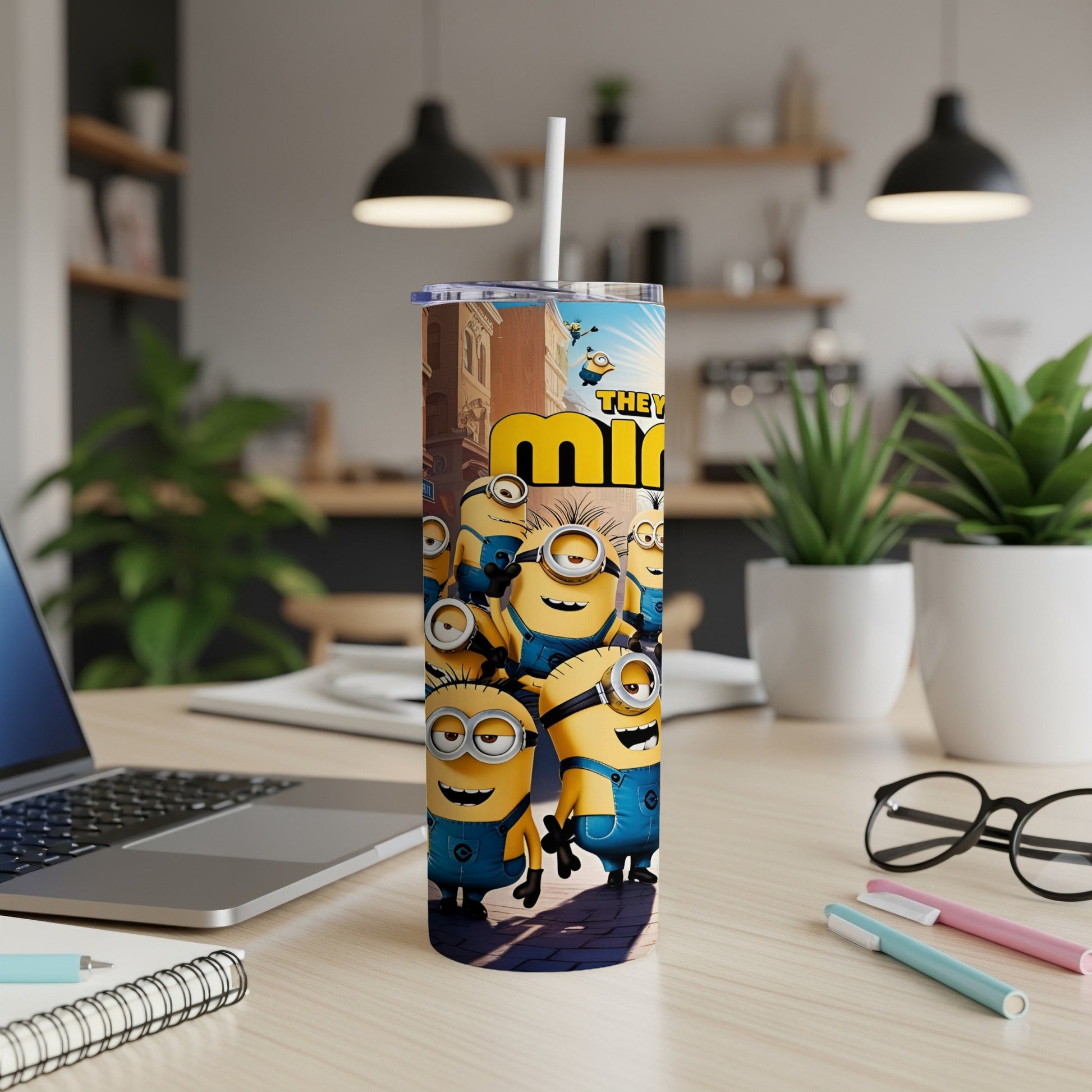 Minions characters with "Minions" text on a white tumbler with a straw.