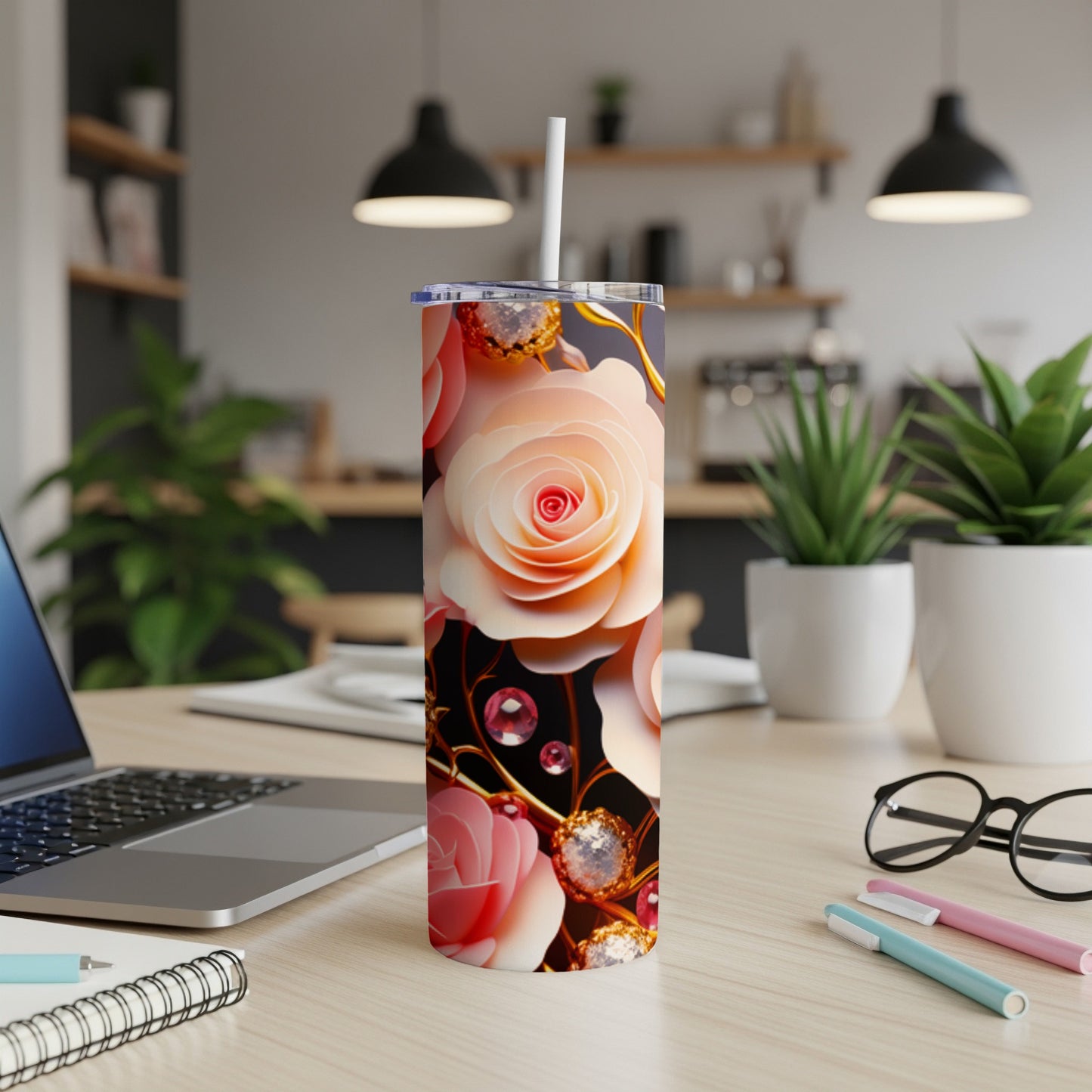 Pink and peach roses with gold accents on a black background, adorning a tumbler.