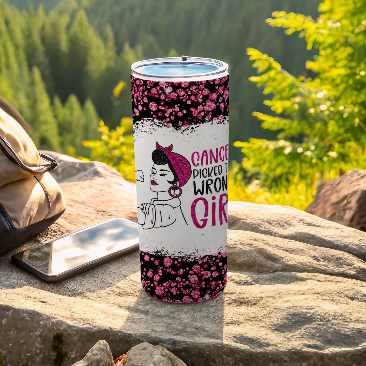 Tumbler with "Cancer picked the wrong girl" text and floral design.
