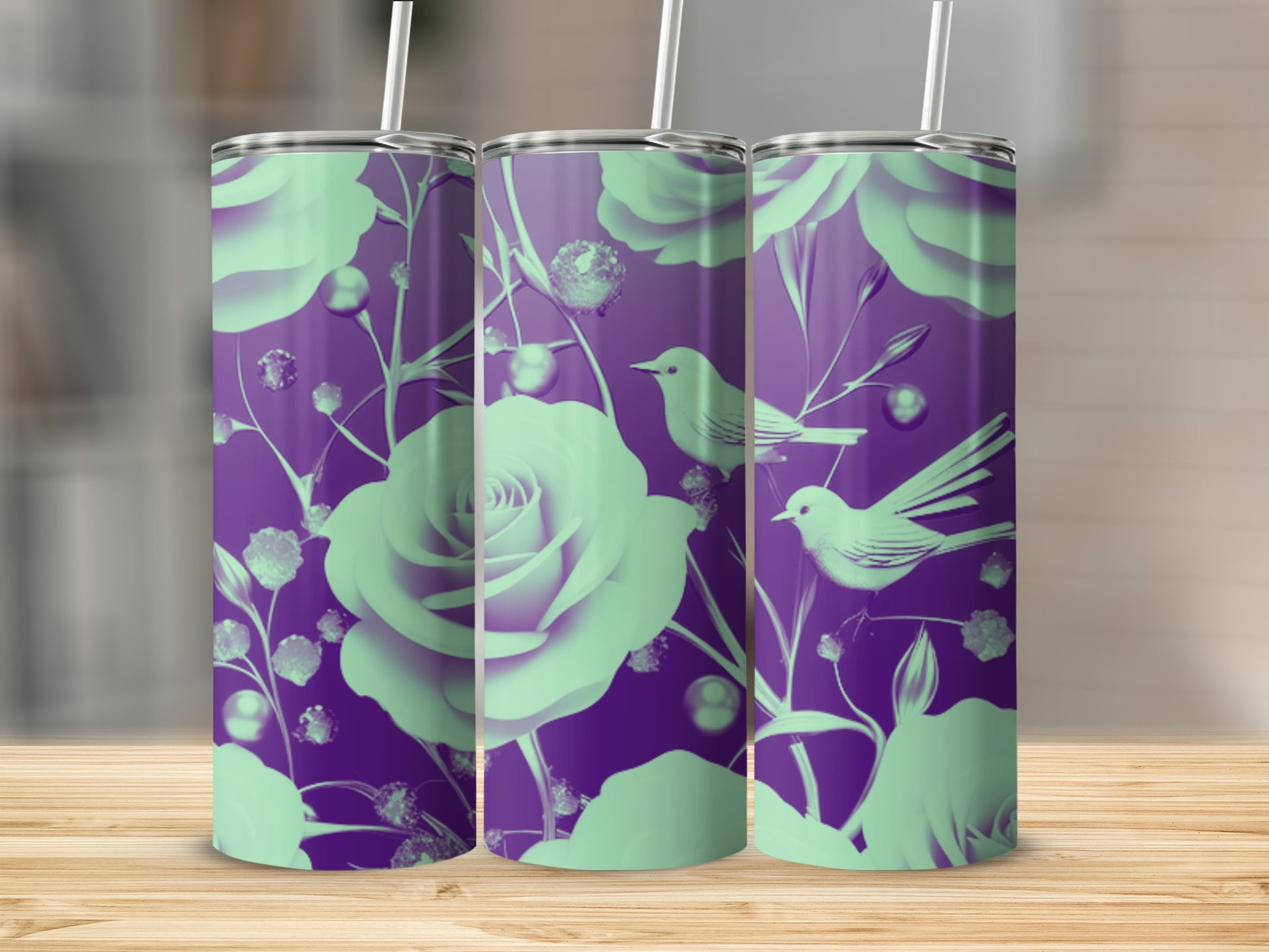 Purple tumbler with mint green floral and bird design.
