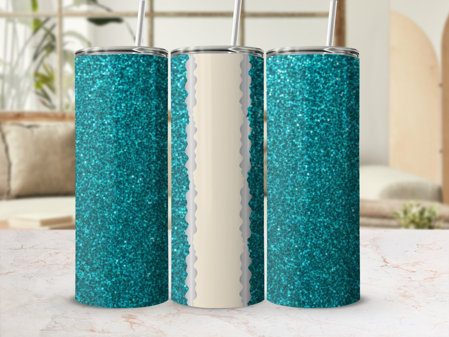 Turquoise glitter tumbler with straw on a marble surface.