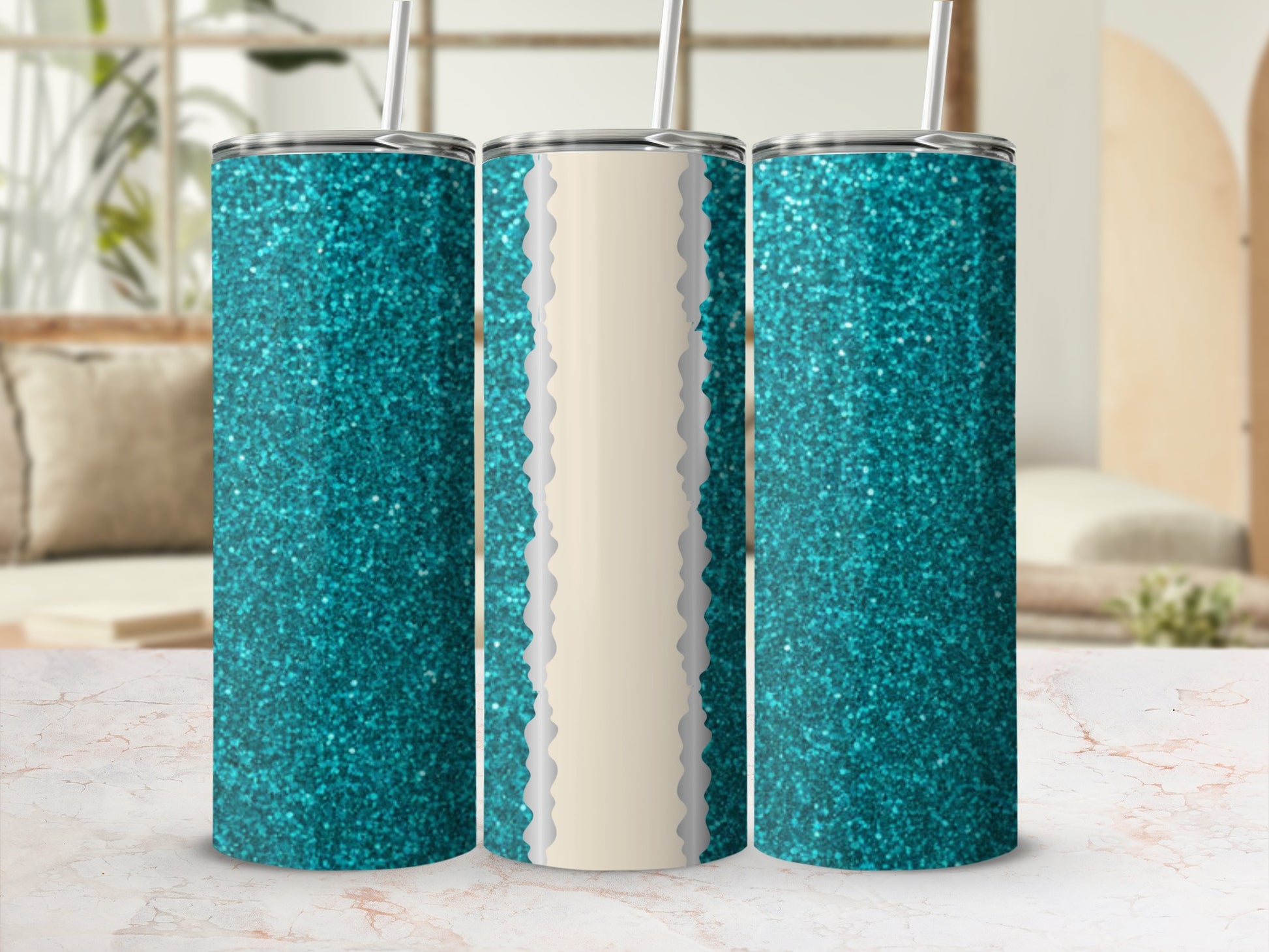 Turquoise glitter tumbler with straw on a marble surface.