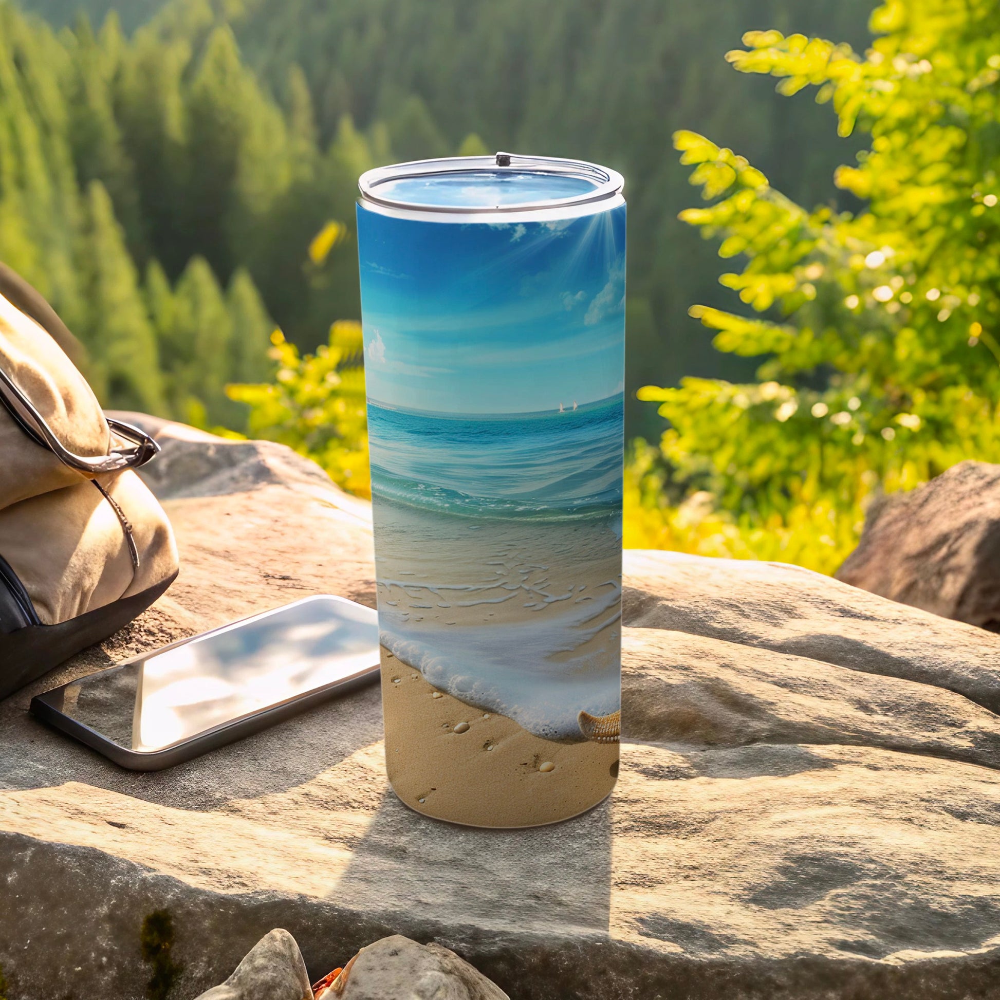 Beach scene tumbler with a seashell and wave on a rock.