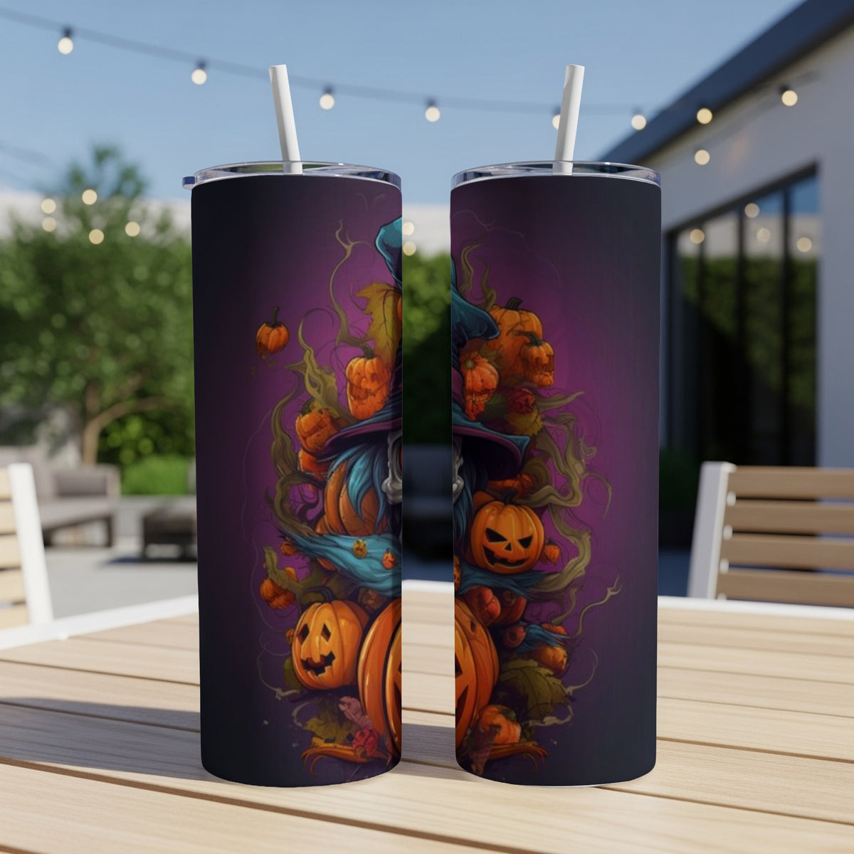 Two tumblers with a spooky Halloween witch and pumpkins design on a purple background.