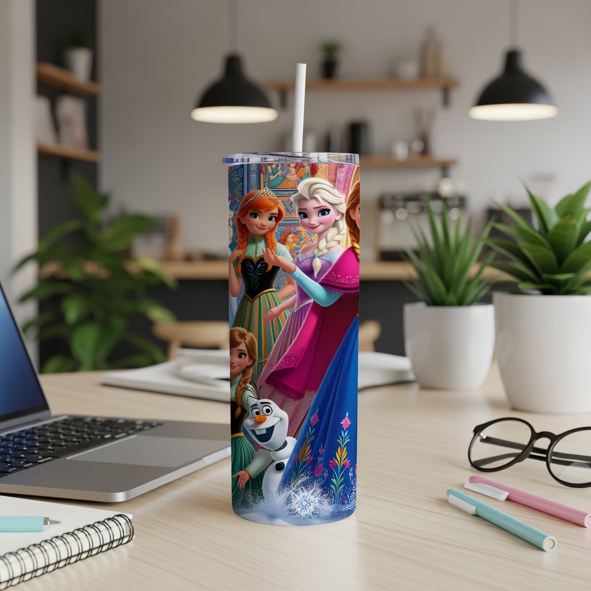 Frozen characters Elsa, Anna, and Olaf on a white insulated tumbler.