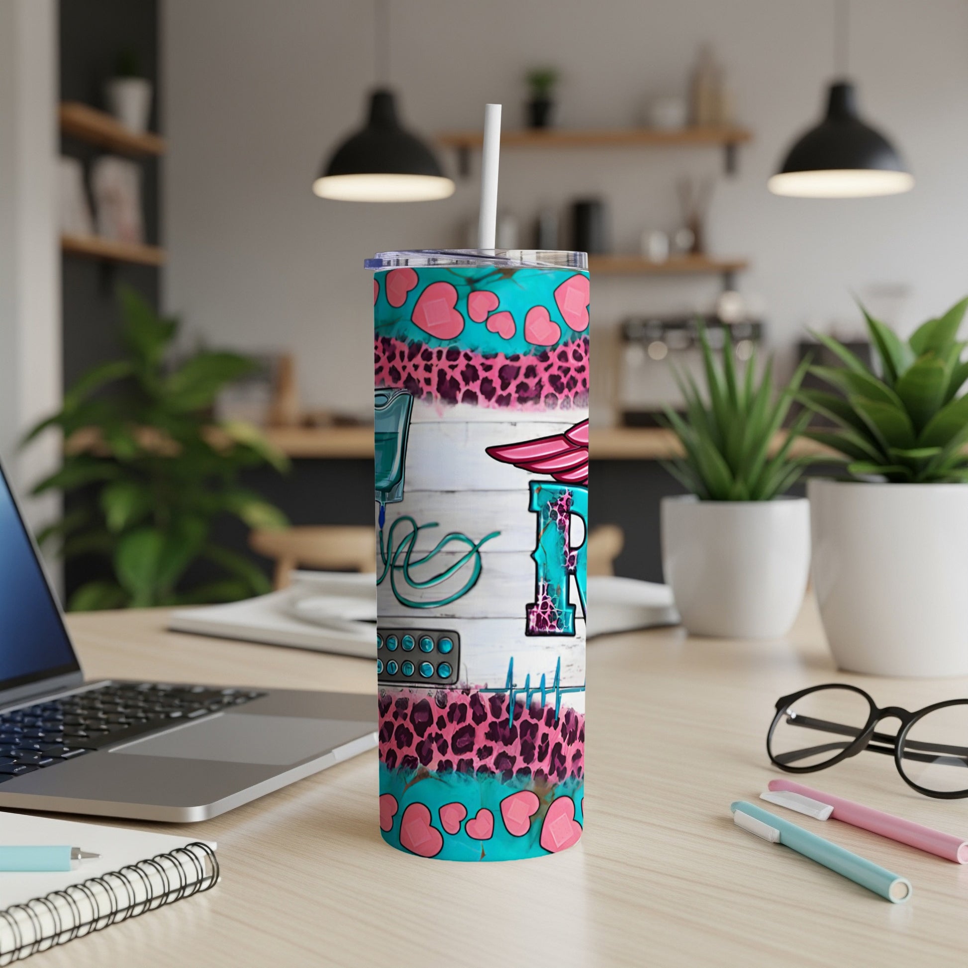Pink and blue leopard print tumbler with medical icons and text.