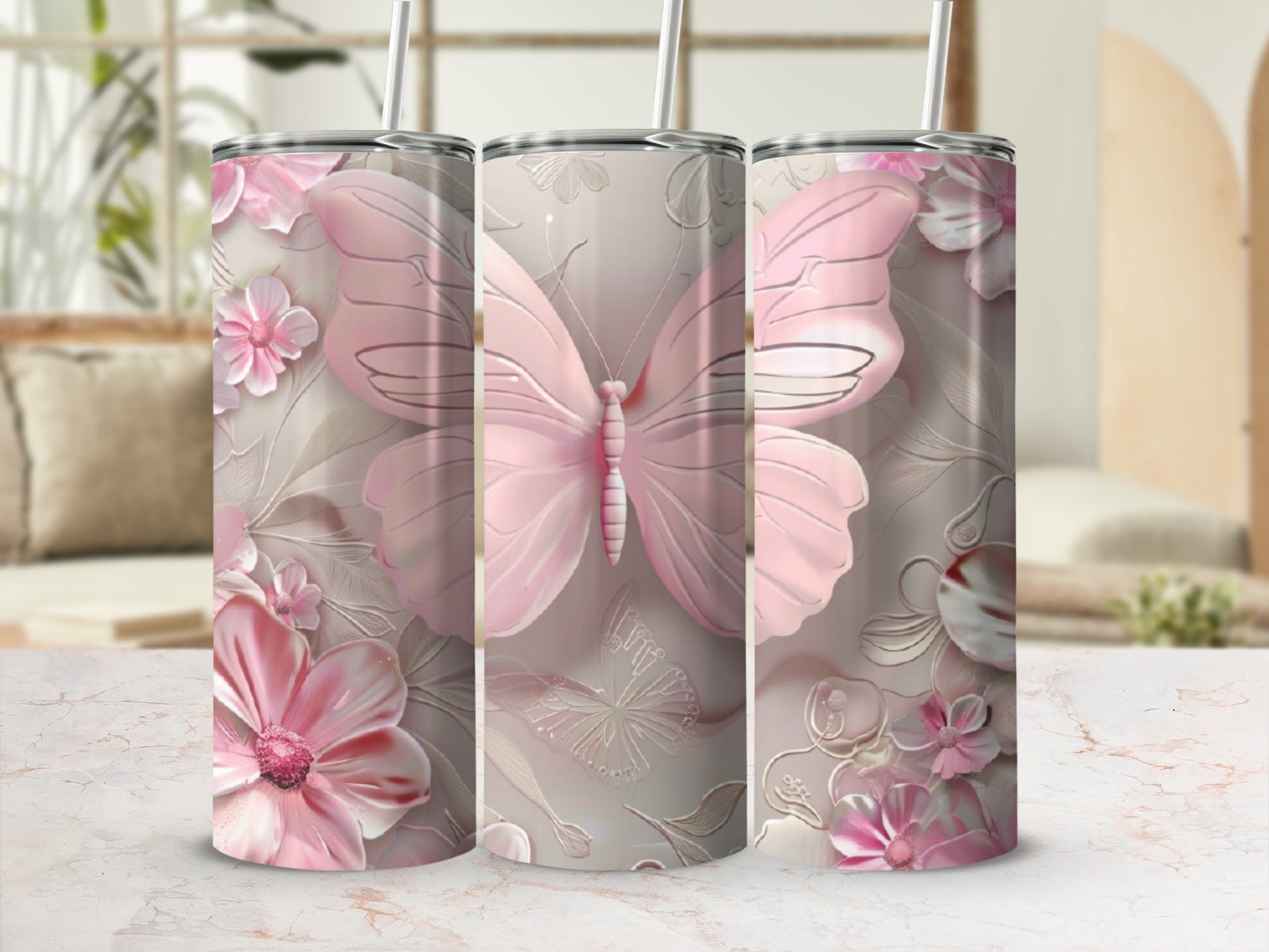 Pink butterfly and floral design on a tumbler.