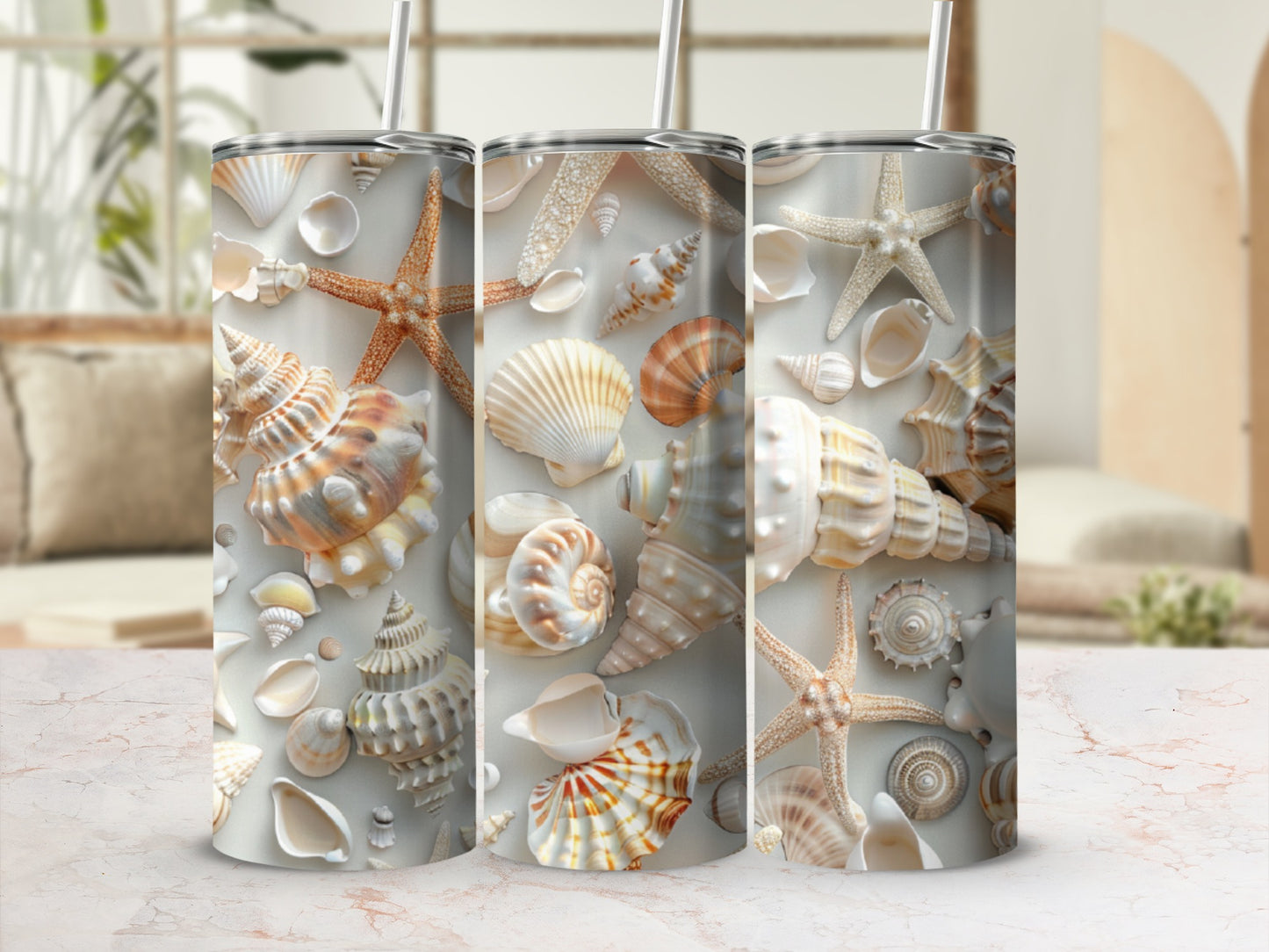 Three tumblers with seashell and starfish pattern.
