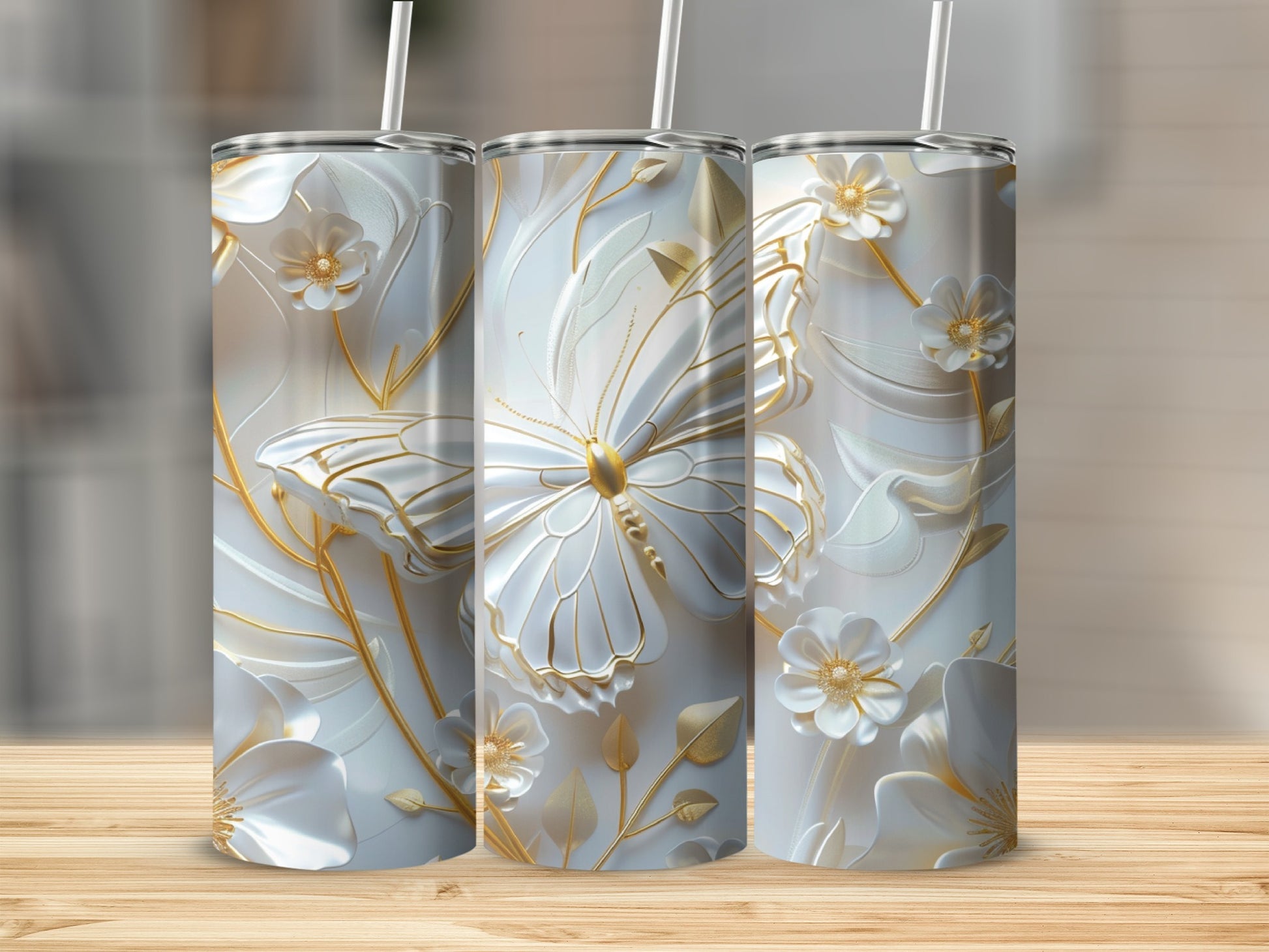 White tumbler with gold butterfly and floral design.
