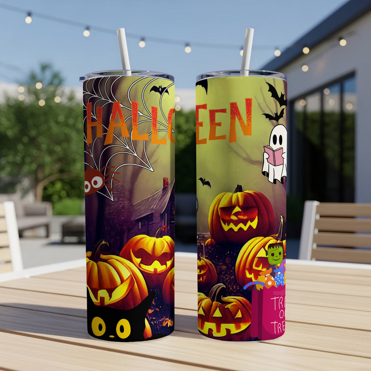 Halloween themed tumblers with pumpkins, a black cat, a ghost reading, and candy.