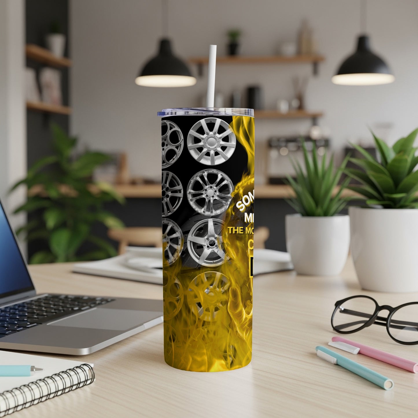 Tumbler with car wheels and yellow flames, "So much more" text.