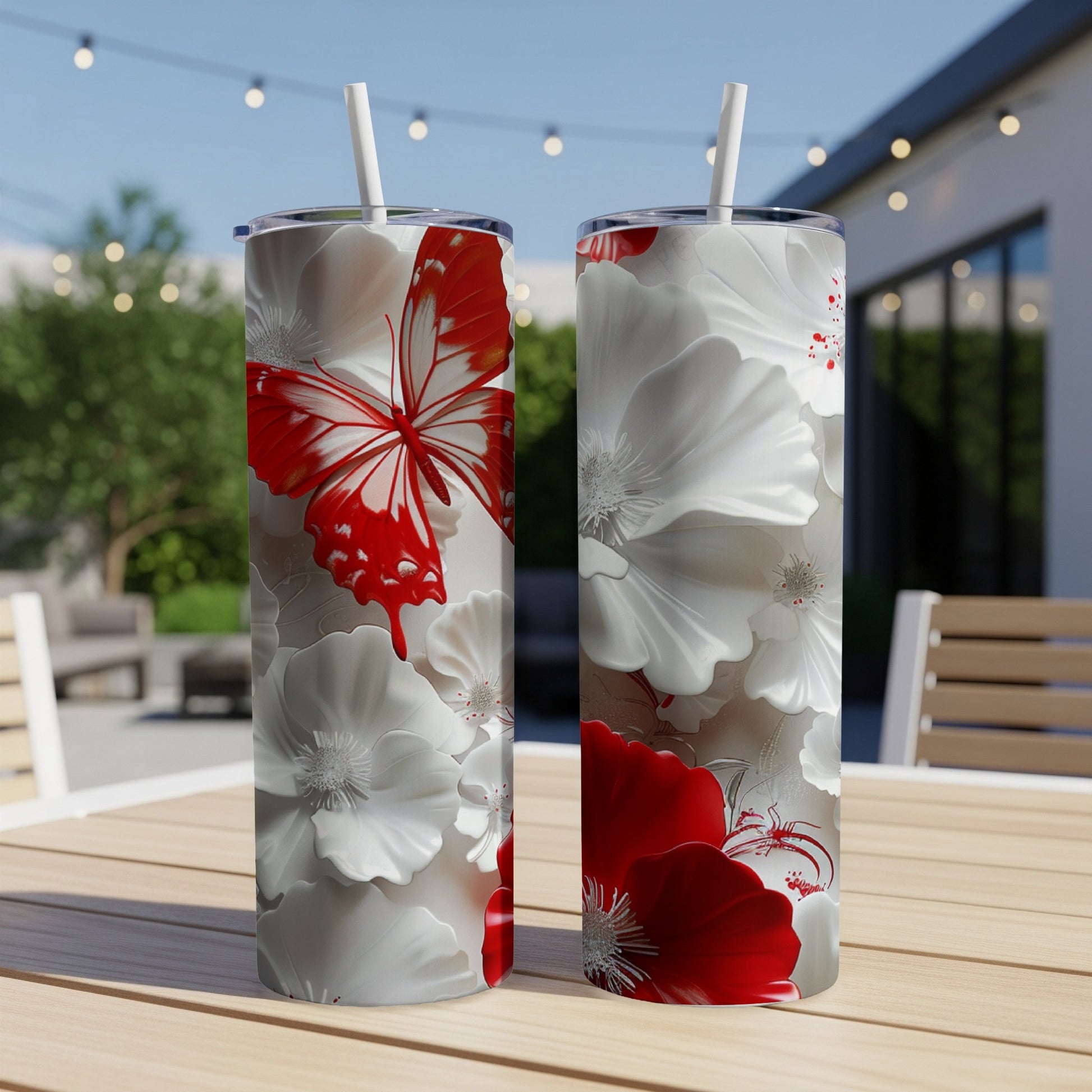Two tumblers with a white and red butterfly and floral pattern.