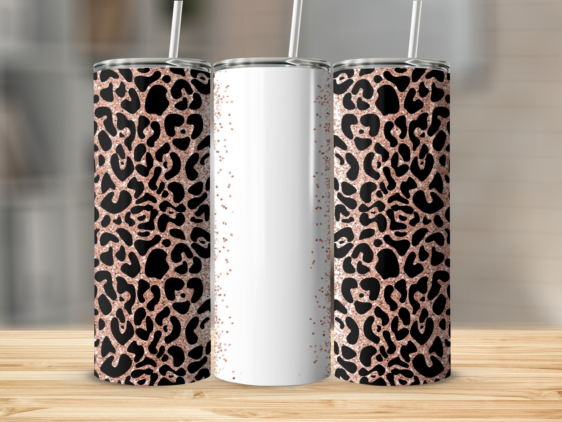 Two tumblers with leopard print and rose gold glitter accents.