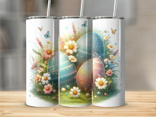 Three colorful Easter eggs nestled in grass and flowers with butterflies.