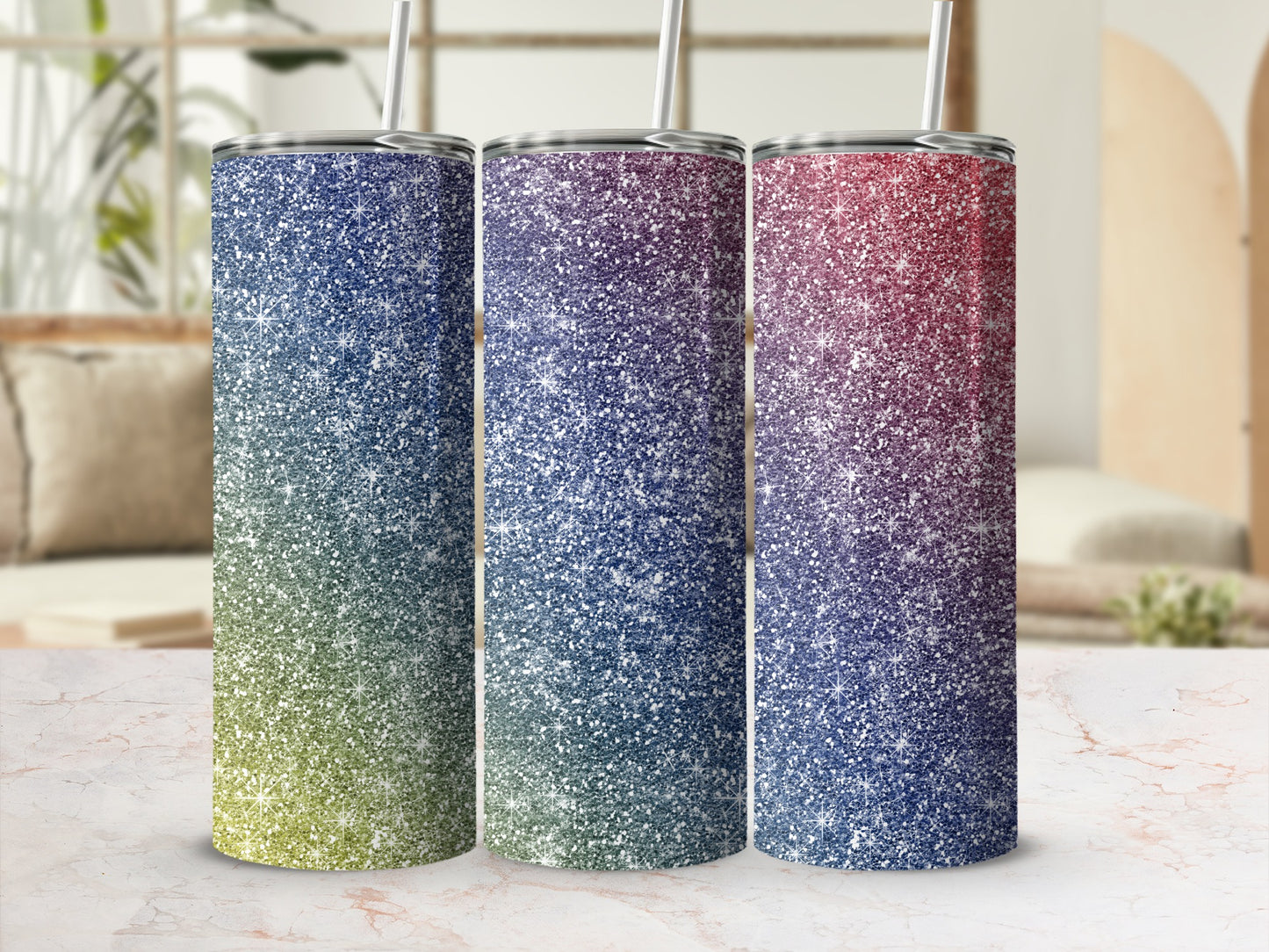 Three glitter gradient tumblers with straws, blue-to-green, blue-to-purple, and red-to-purple.