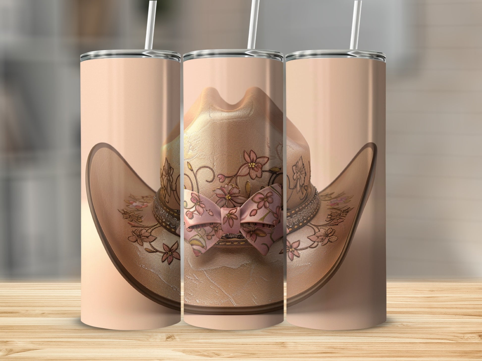 Cowboy hat tumbler with floral and pink bow design.