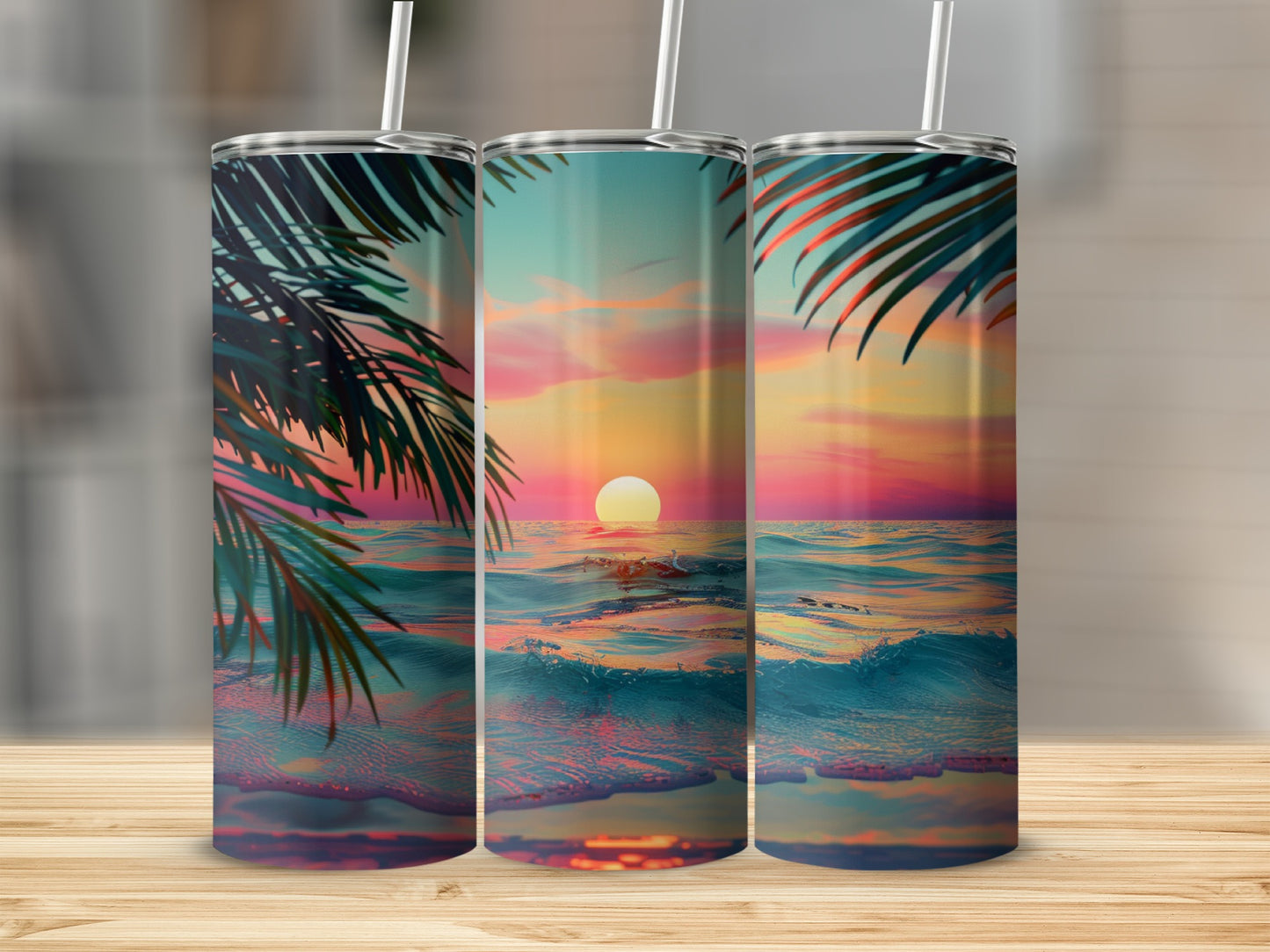 Three tumblers with a sunset beach scene featuring palm fronds.