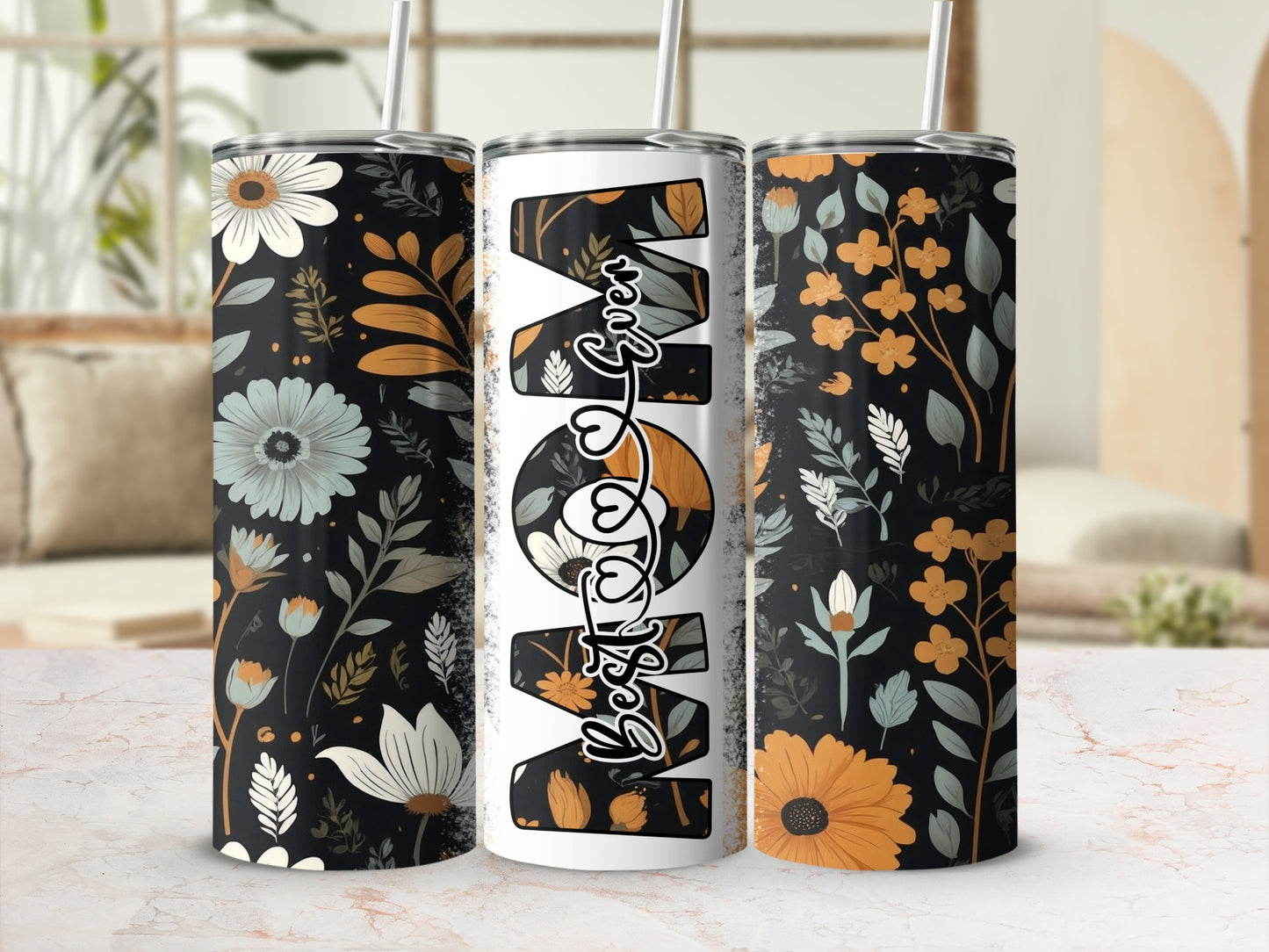 Floral Mom tumbler with straw, black background and orange accents.