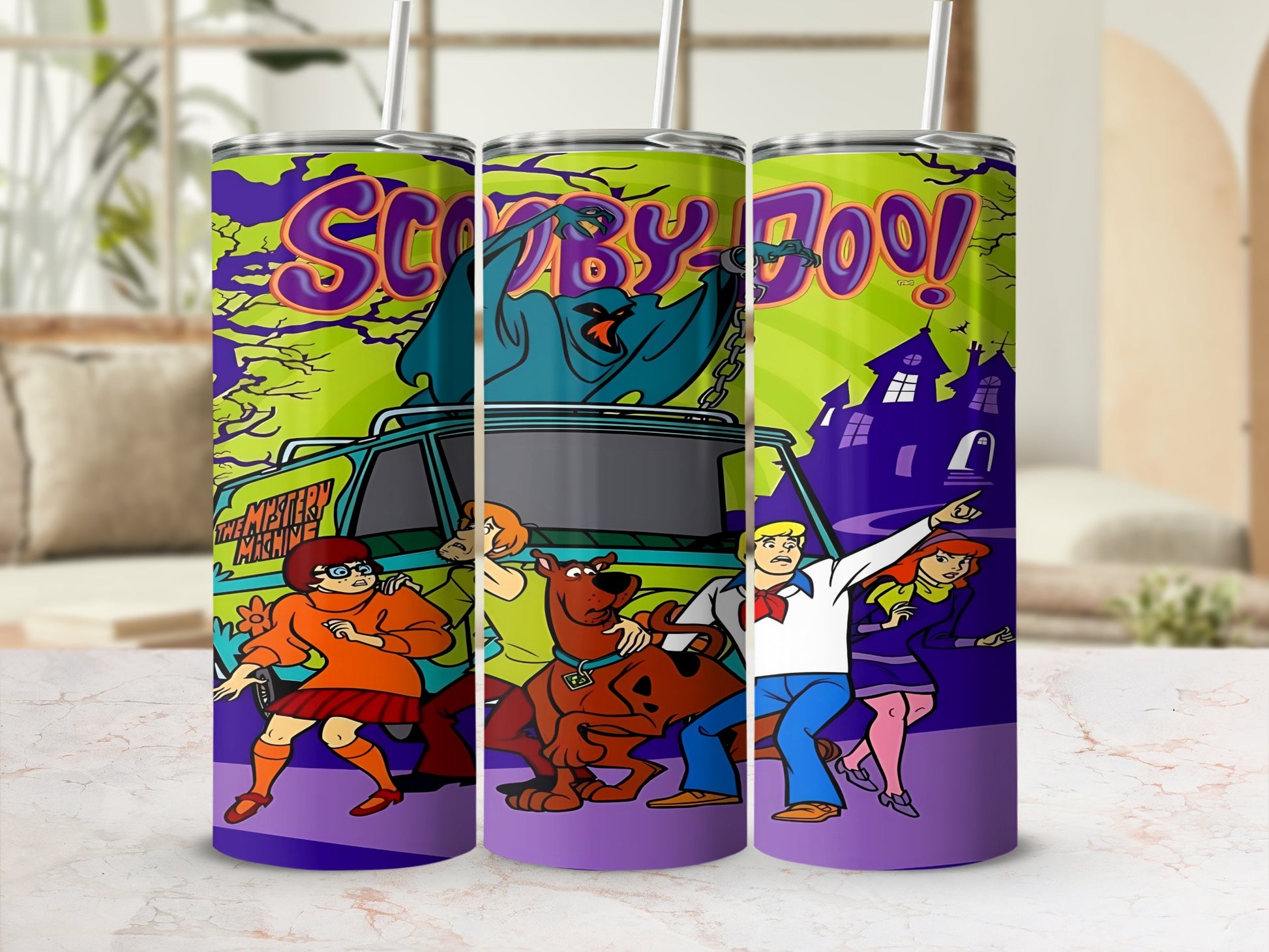 Scooby-Doo characters and Mystery Machine on a purple and green tumbler.